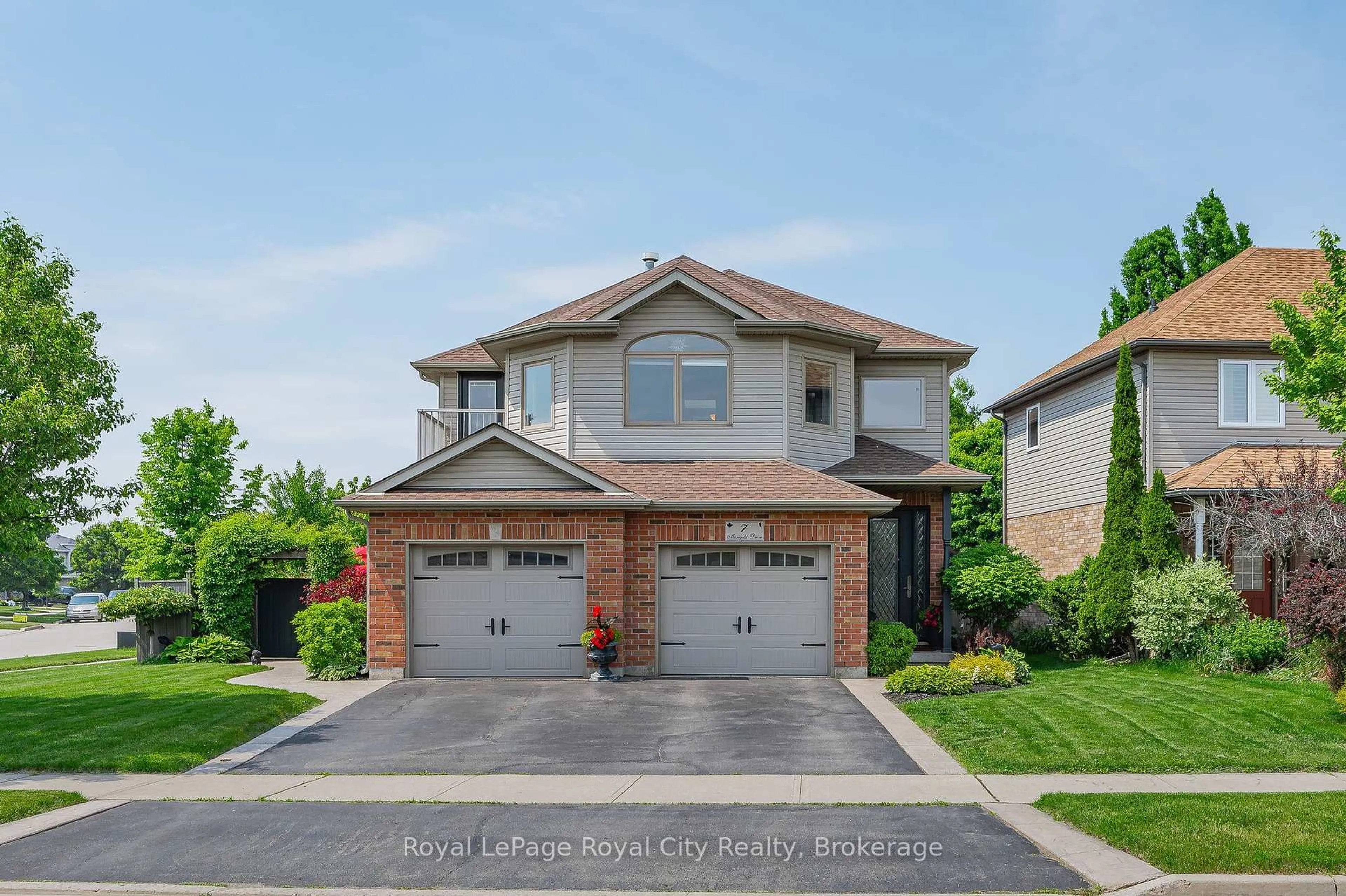 Home with brick exterior material, street for 7 Marigold Dr, Guelph Ontario N1C 1G5