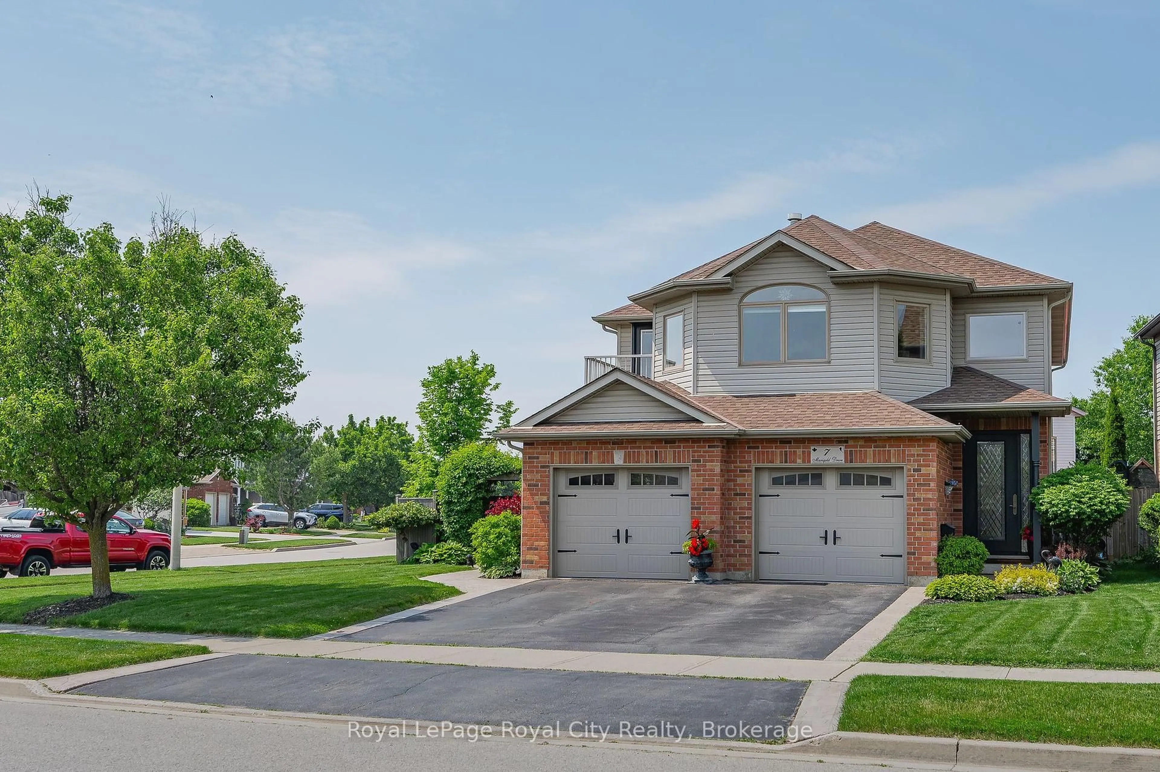 Home with brick exterior material, street for 7 Marigold Dr, Guelph Ontario N1C 1G5