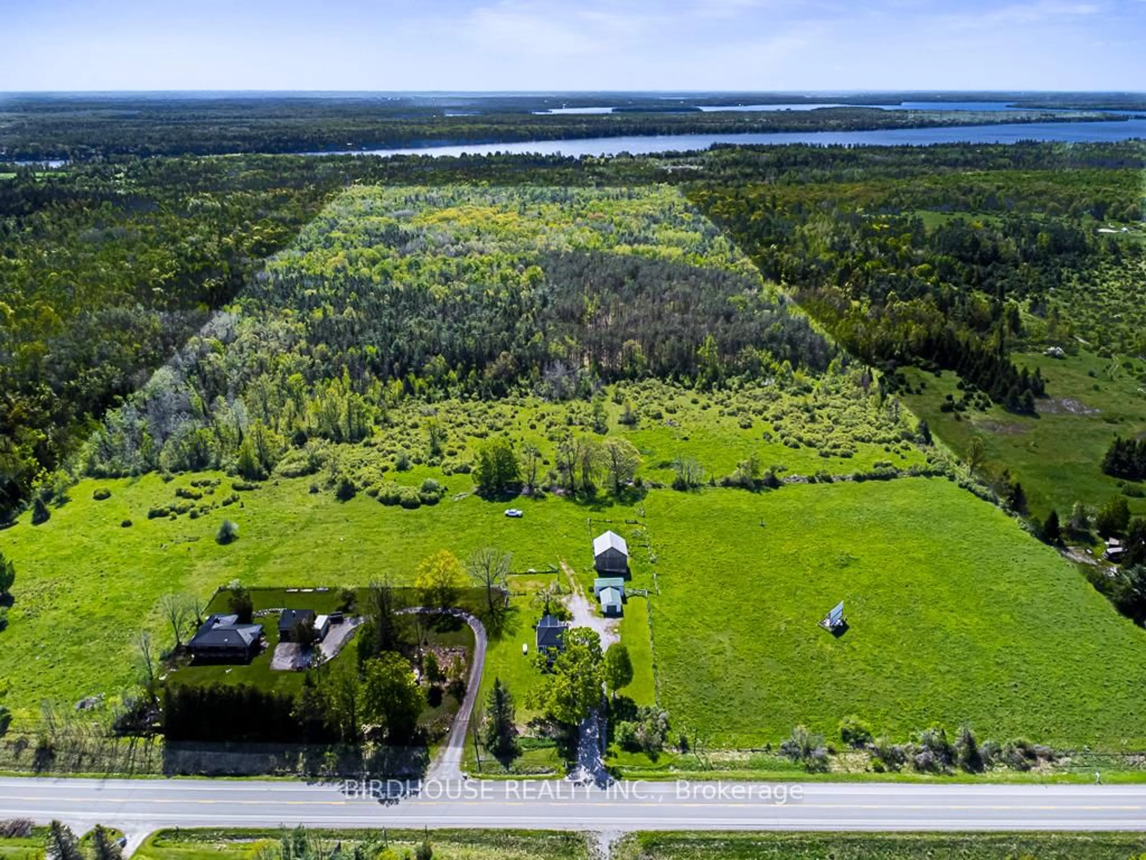 A pic from outside/outdoor area/front of a property/back of a property/a pic from drone, water/lake/river/ocean view for 2426 County Road 48, Kawartha Lakes Ontario K0M 2B0