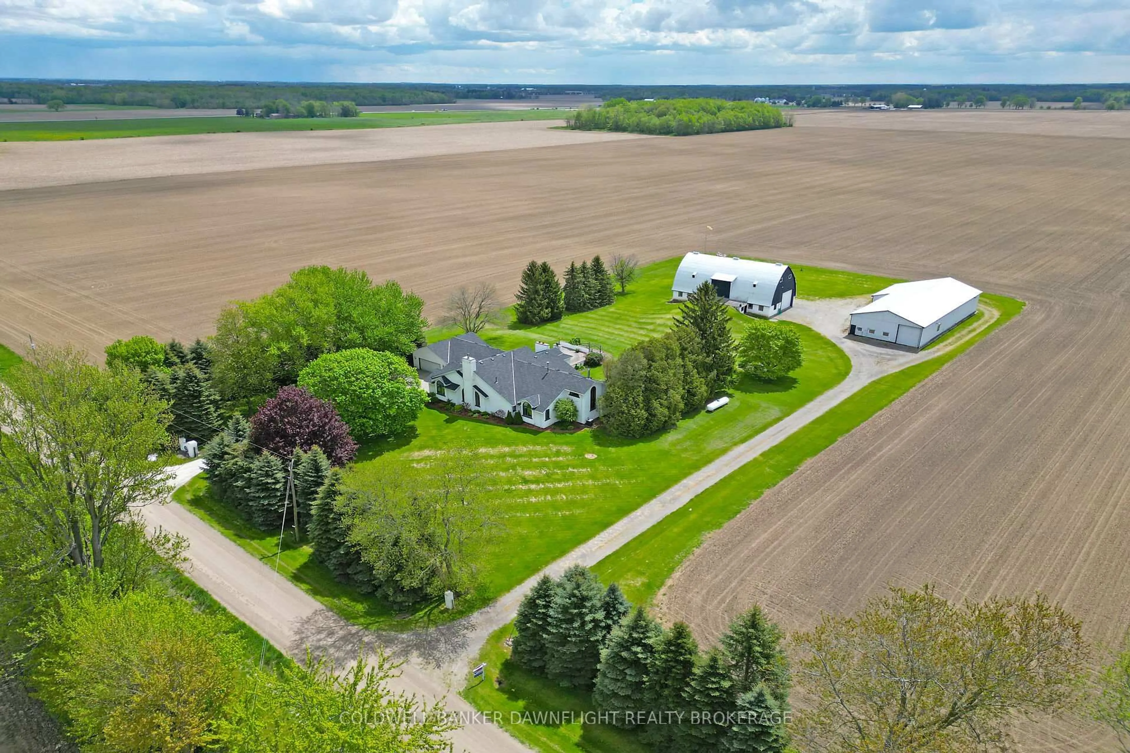 A pic from outside/outdoor area/front of a property/back of a property/a pic from drone, unknown for 15099 Sixteen Mile Rd, Middlesex Centre Ontario N0M 1P0