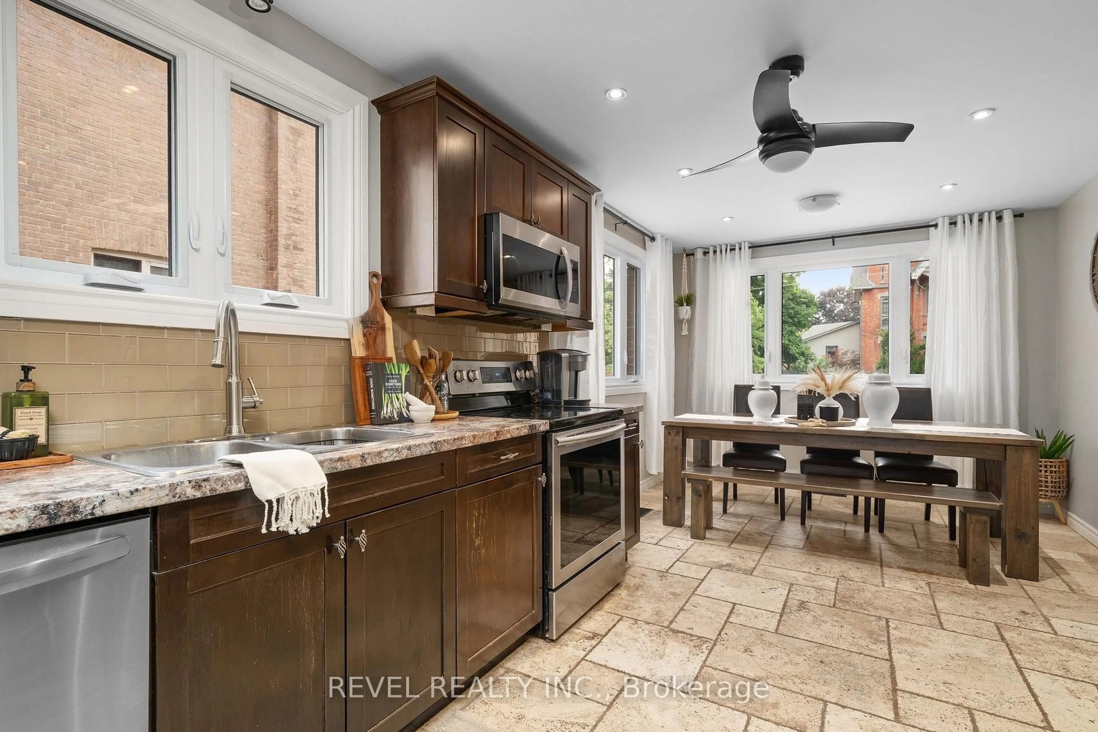 Open concept kitchen, ceramic/tile floor for 48 Cambridge St, Kawartha Lakes Ontario K9V 4C7