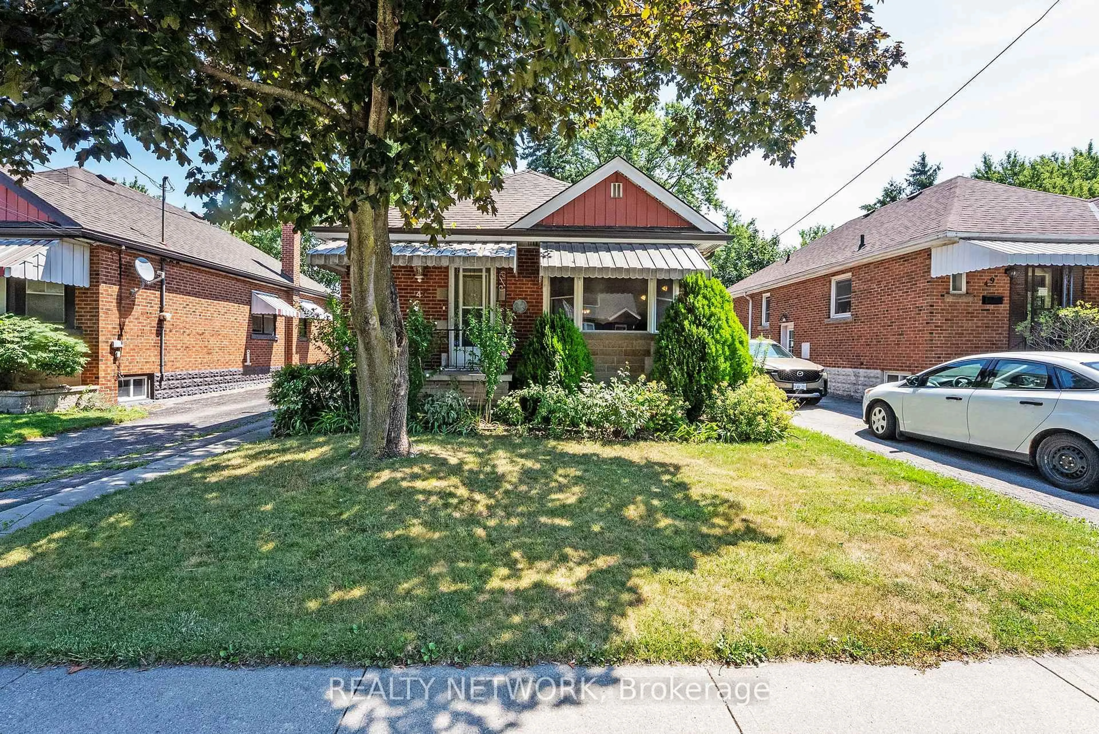 Home with brick exterior material, street for 47 West 3rd St, Hamilton Ontario L9C 3K1