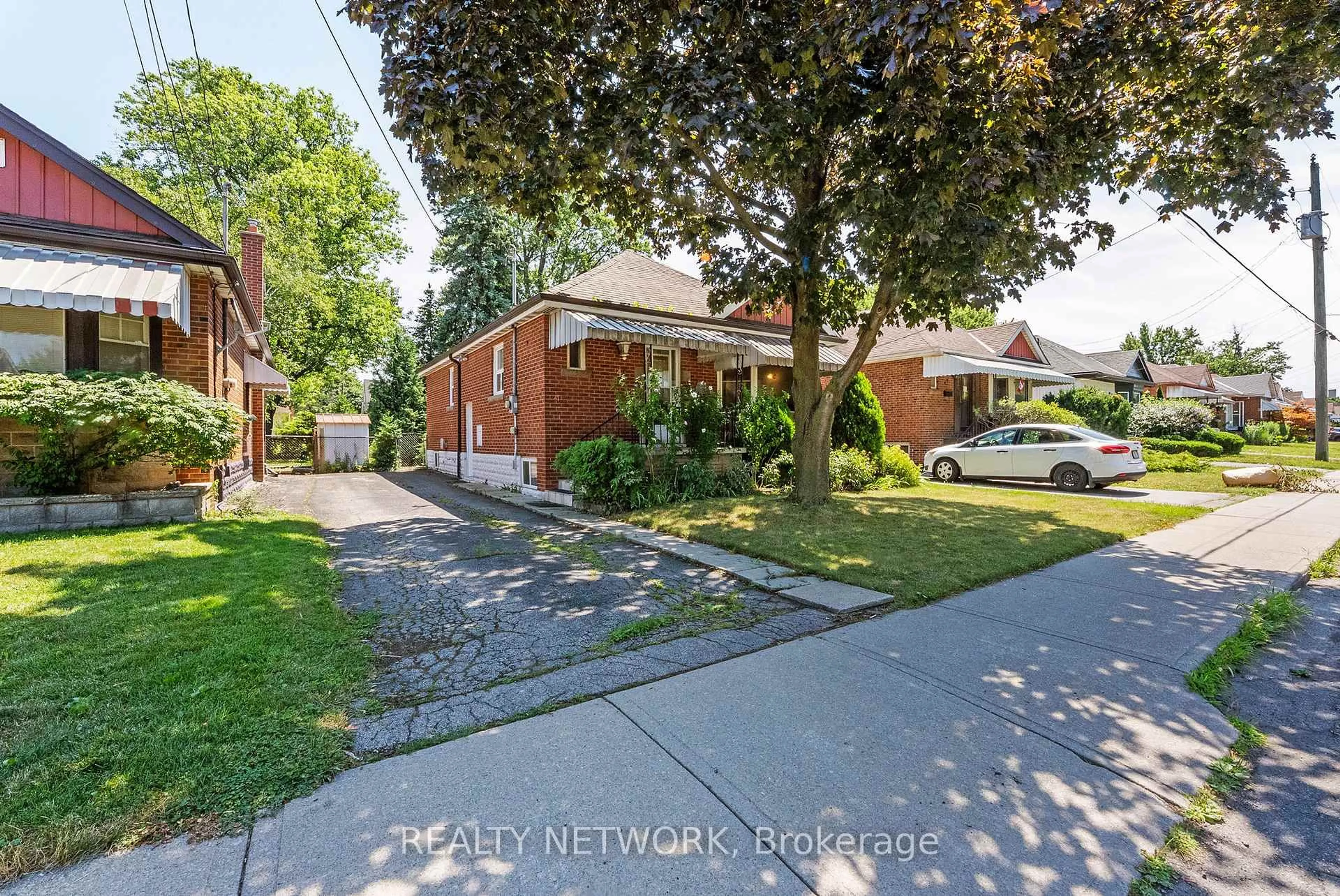Home with brick exterior material, street for 47 West 3rd St, Hamilton Ontario L9C 3K1