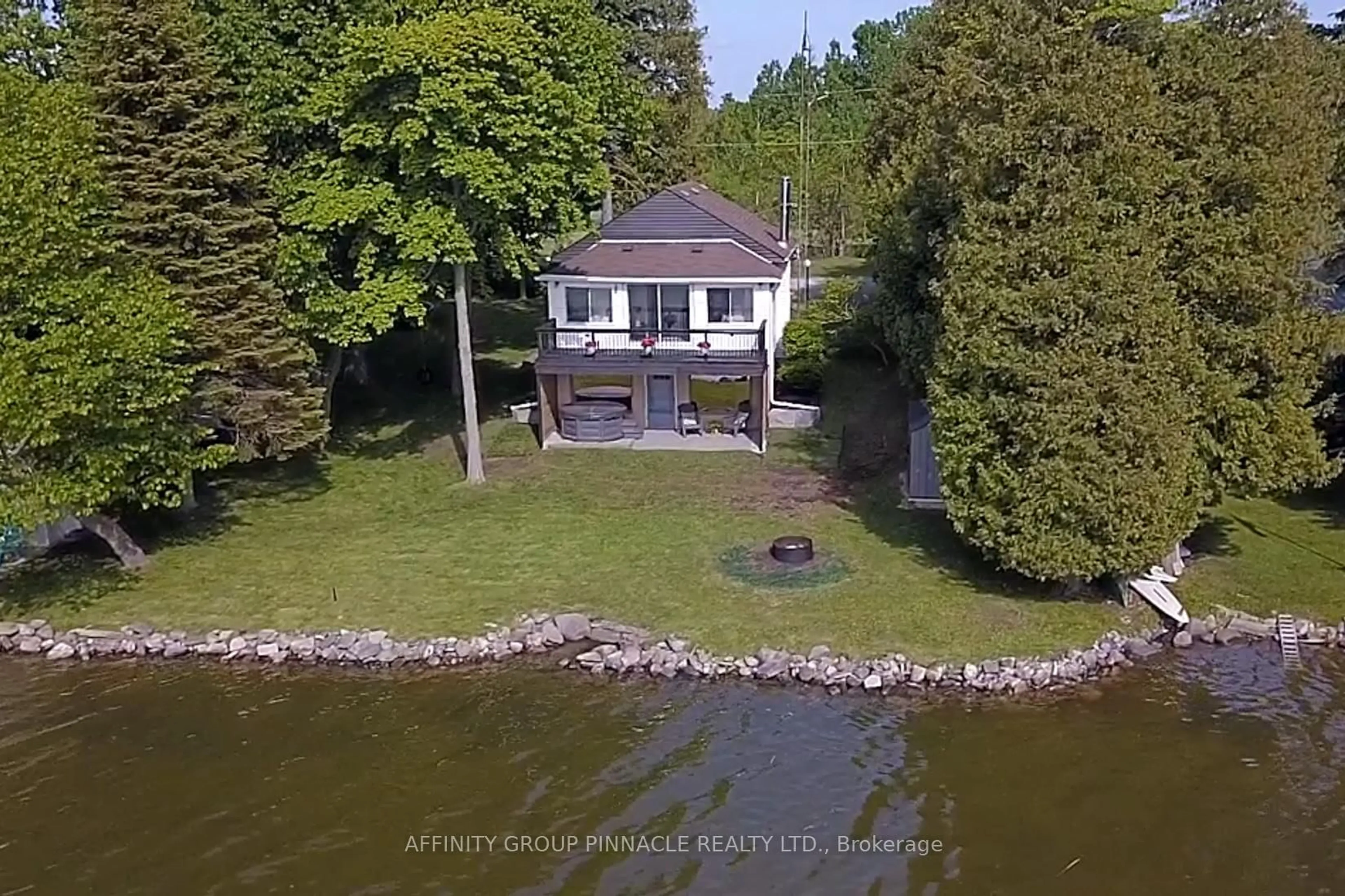 A pic from outside/outdoor area/front of a property/back of a property/a pic from drone, water/lake/river/ocean view for 35 Loon St, Kawartha Lakes Ontario L0B 1K0