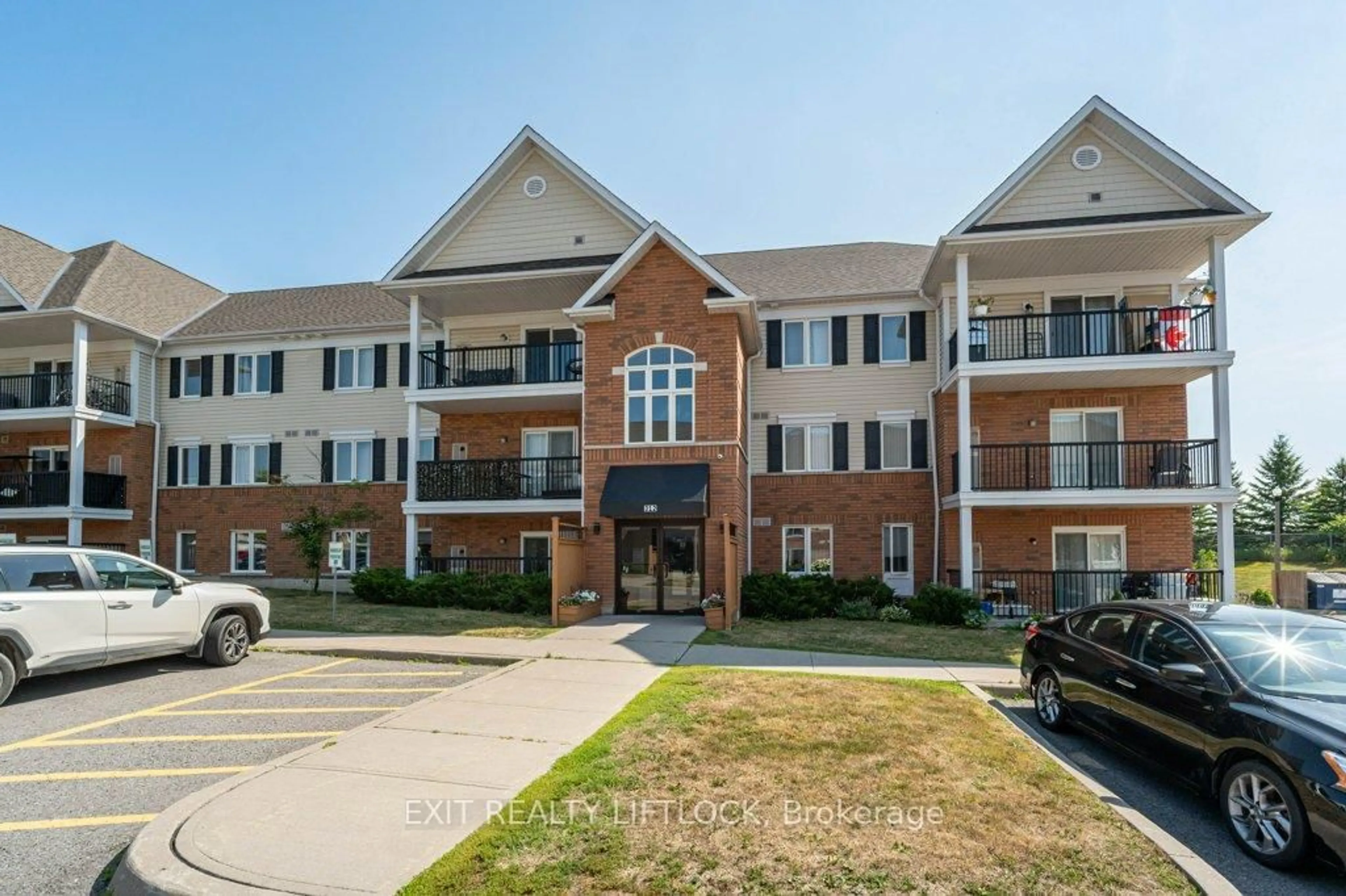 A pic from outside/outdoor area/front of a property/back of a property/a pic from drone, unknown for 312 Spillsbury Dr #303, Peterborough West Ontario K9K 0B6