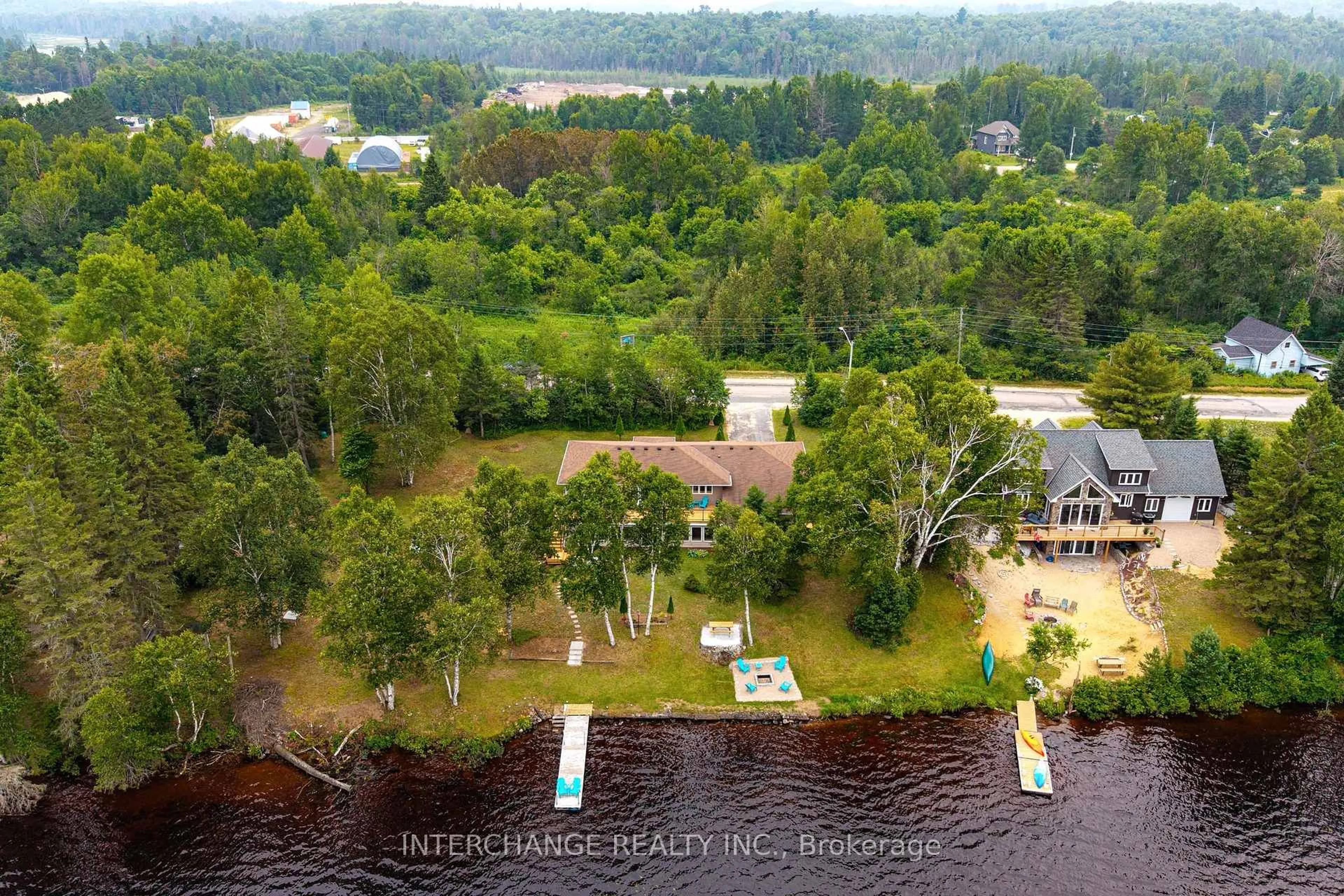 A pic from outside/outdoor area/front of a property/back of a property/a pic from drone, water/lake/river/ocean view for 26 Ottawa Ave, South River Ontario P0A 1X0