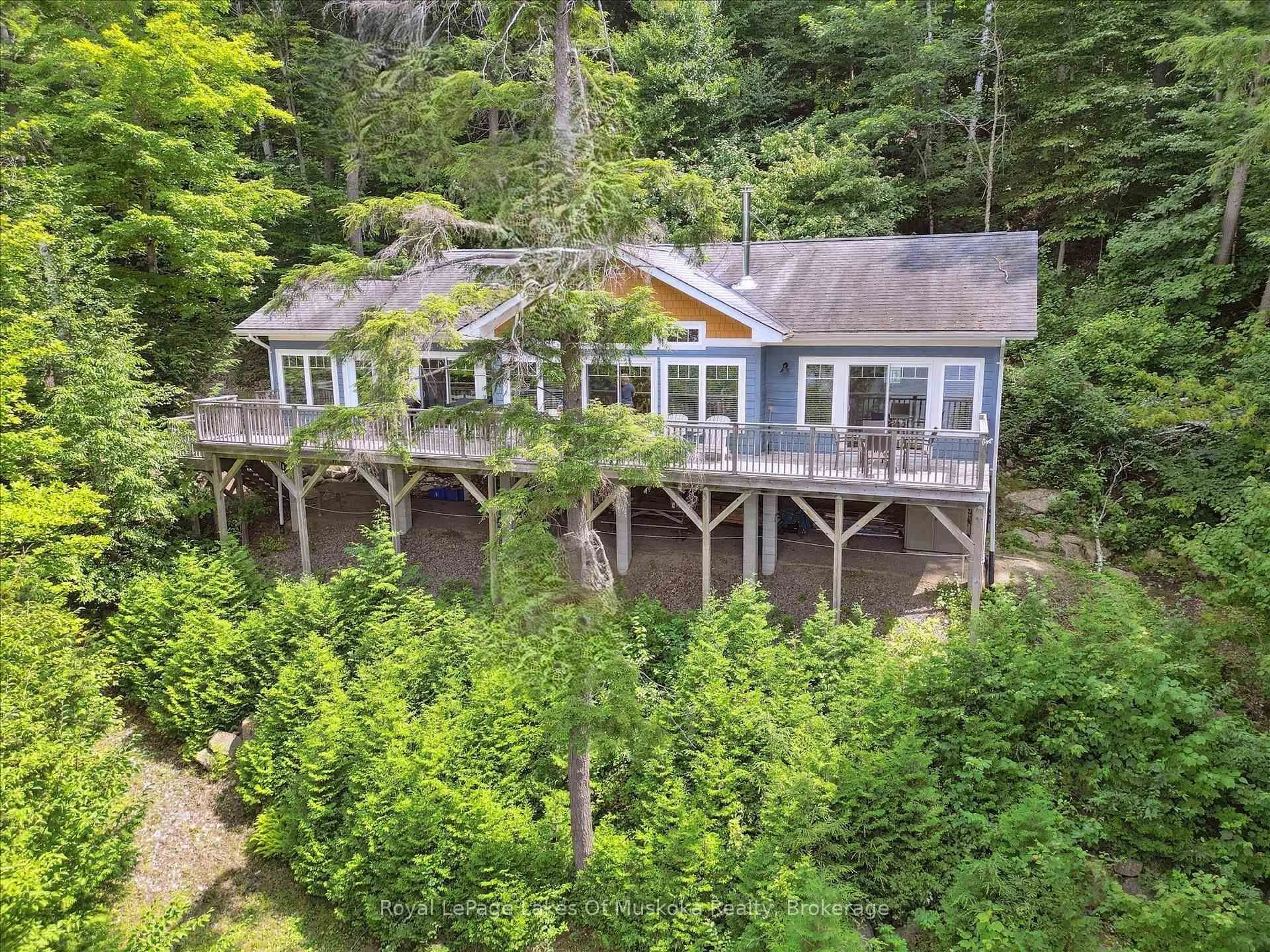 A pic from outside/outdoor area/front of a property/back of a property/a pic from drone, water/lake/river/ocean view for 16368 Kawagama-Dennison Island, Dysart et al Ontario K0M 1S0