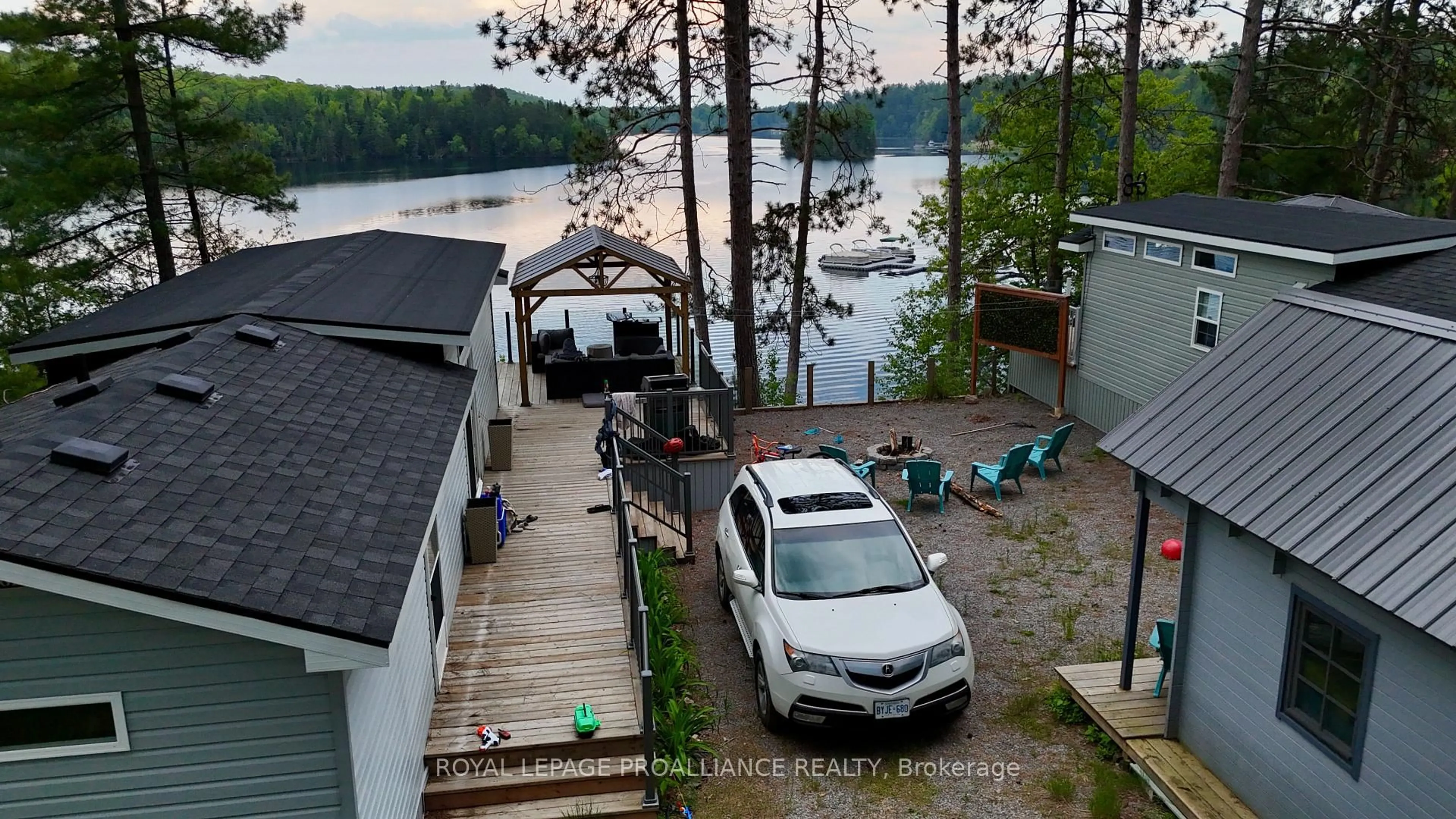 A pic from outside/outdoor area/front of a property/back of a property/a pic from drone, water/lake/river/ocean view for 240 Pinewood Park Rd #H20, Haley Station Ontario K0J 1Y0