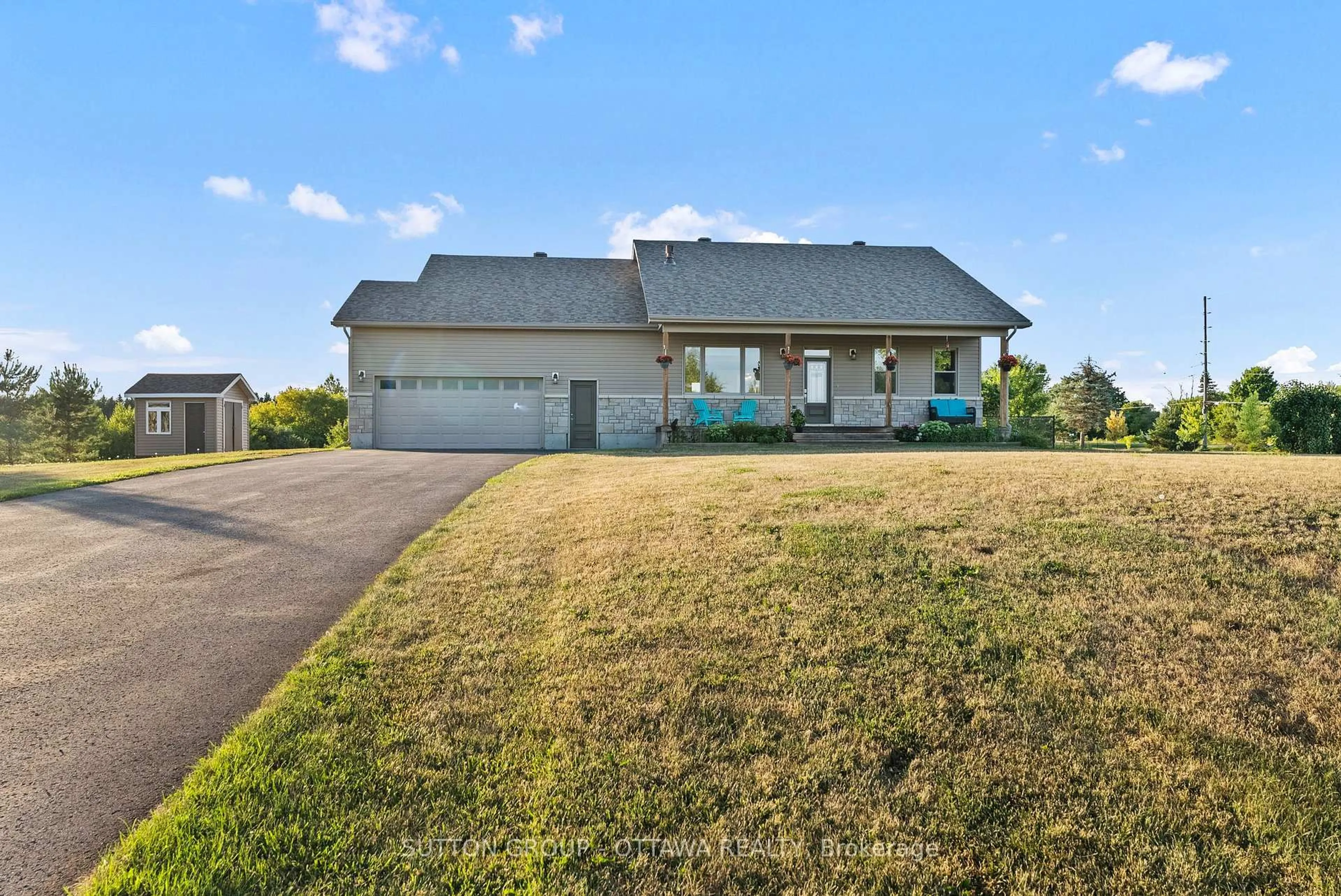 A pic from outside/outdoor area/front of a property/back of a property/a pic from drone, unknown for 203 MCGILL Rd, North Grenville Ontario K0G 1J0