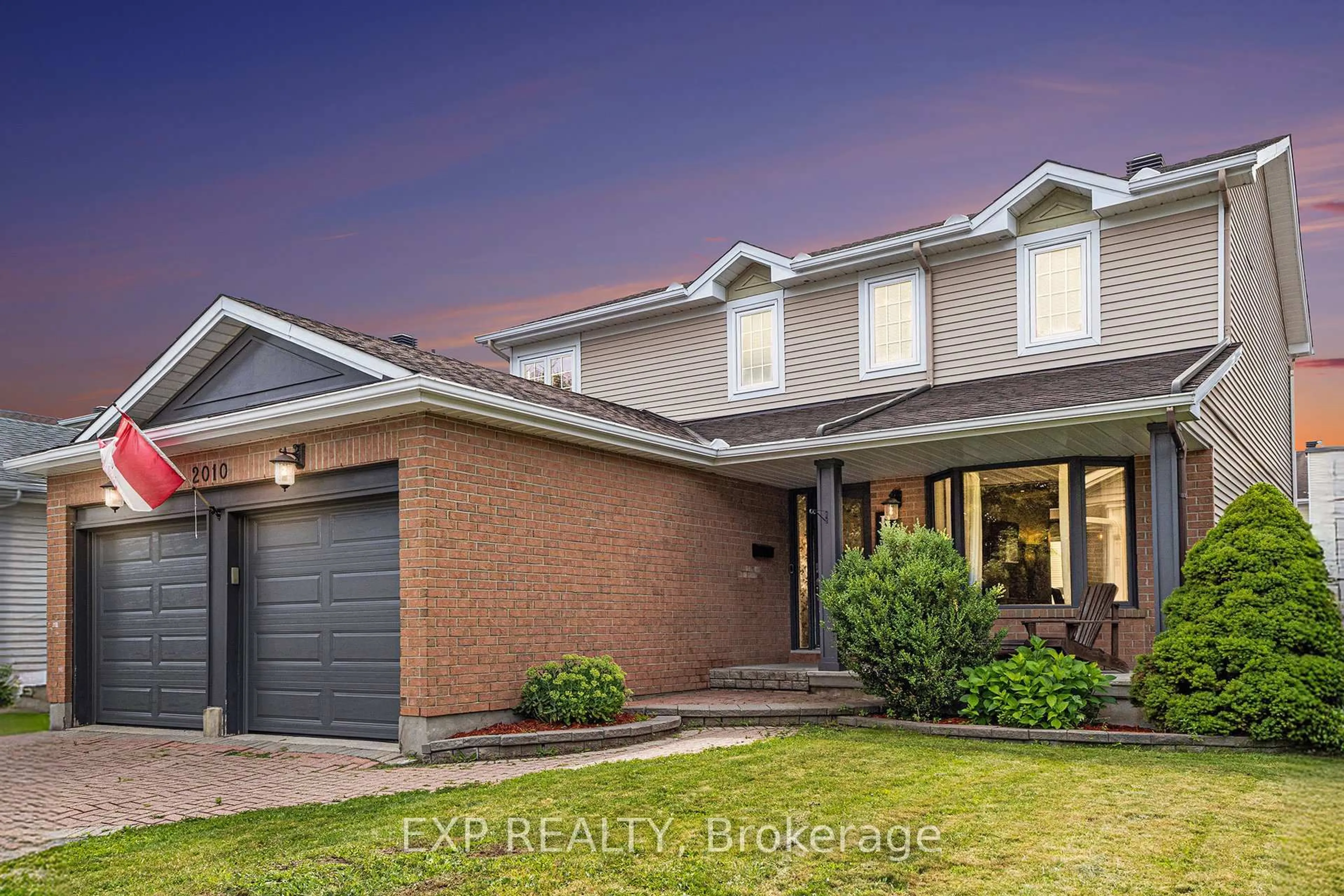 Home with brick exterior material, street for 2010 Rolling Brook Dr, Ottawa Ontario K1W 1C7