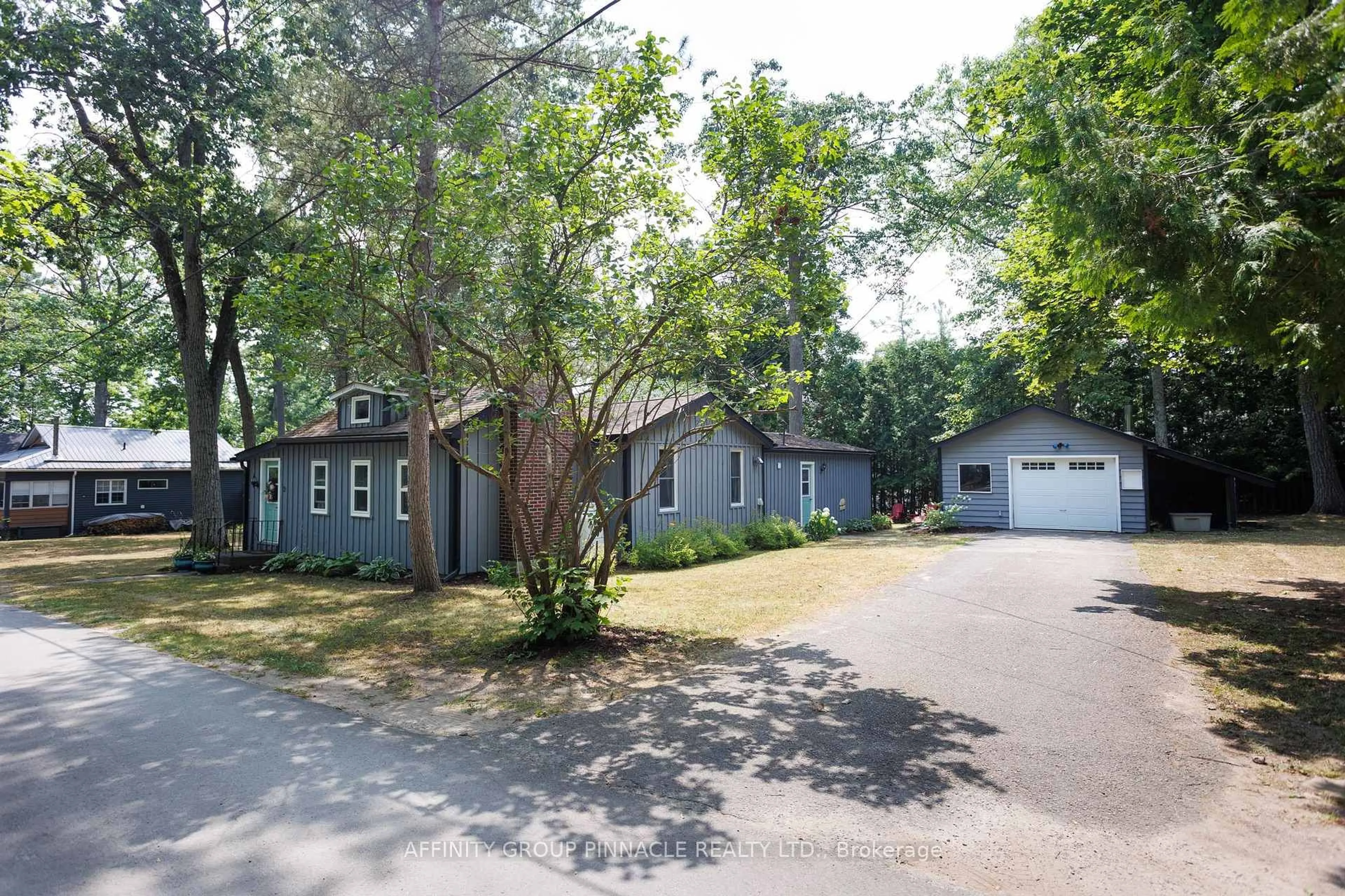 A pic from outside/outdoor area/front of a property/back of a property/a pic from drone, street for 21 4th St, Kawartha Lakes Ontario K0M 1N0