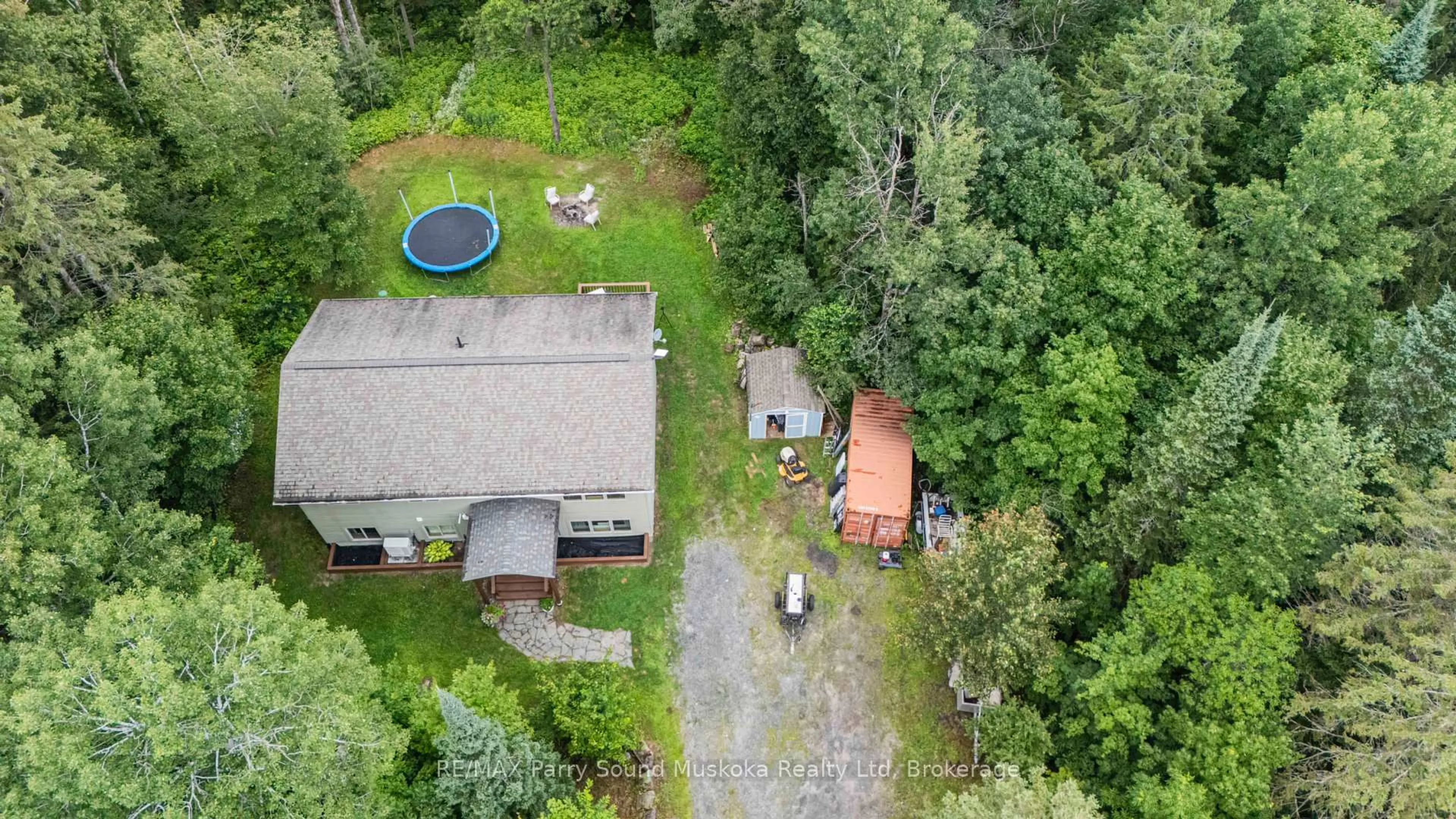 A pic from outside/outdoor area/front of a property/back of a property/a pic from drone, unknown for 312 Centre Rd, McKellar Ontario P2A 0B4