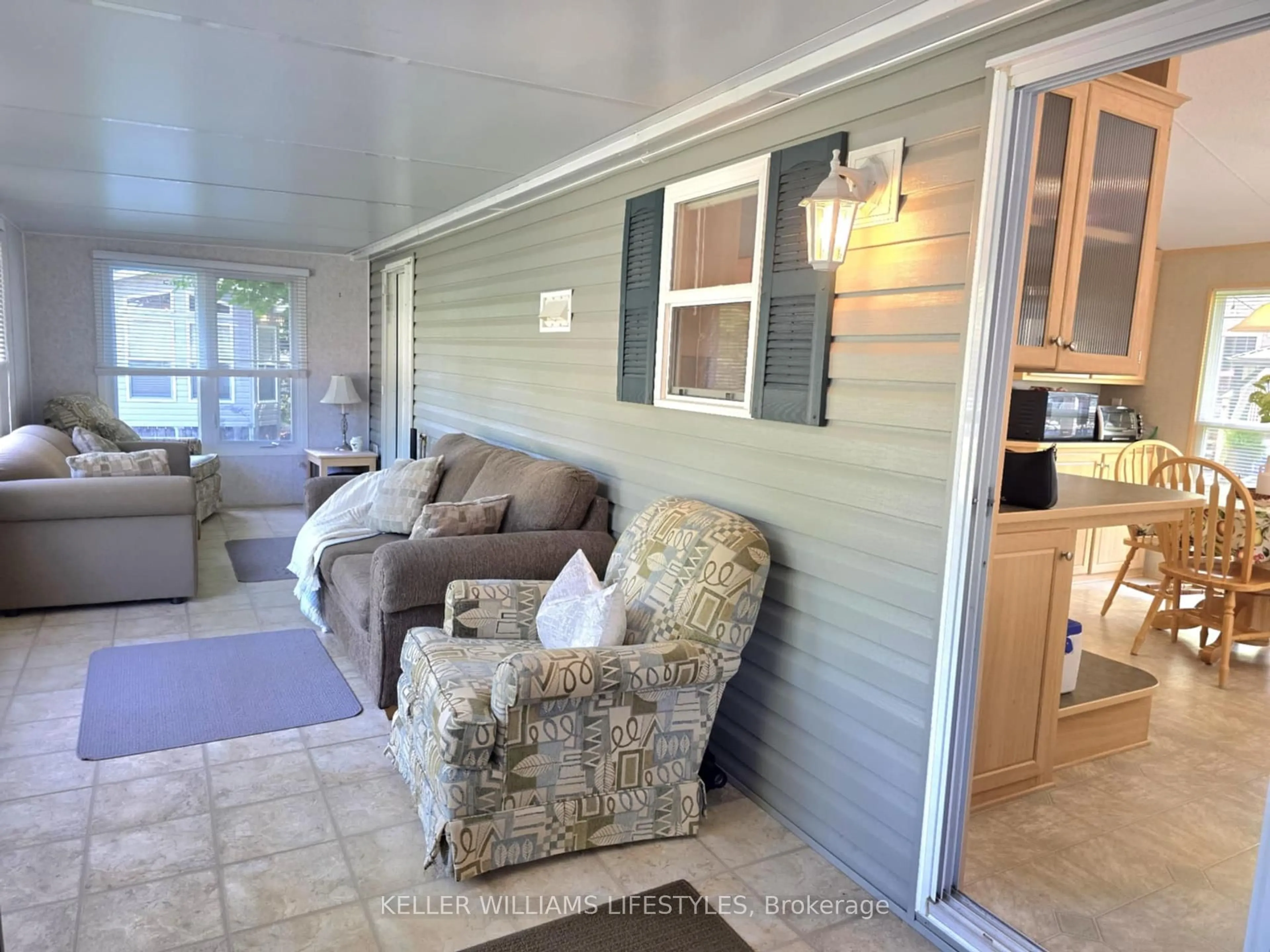 Living room with furniture, unknown for 9338 West Ipperwash Rd #JJ23, Lambton Shores Ontario N0N 1J2