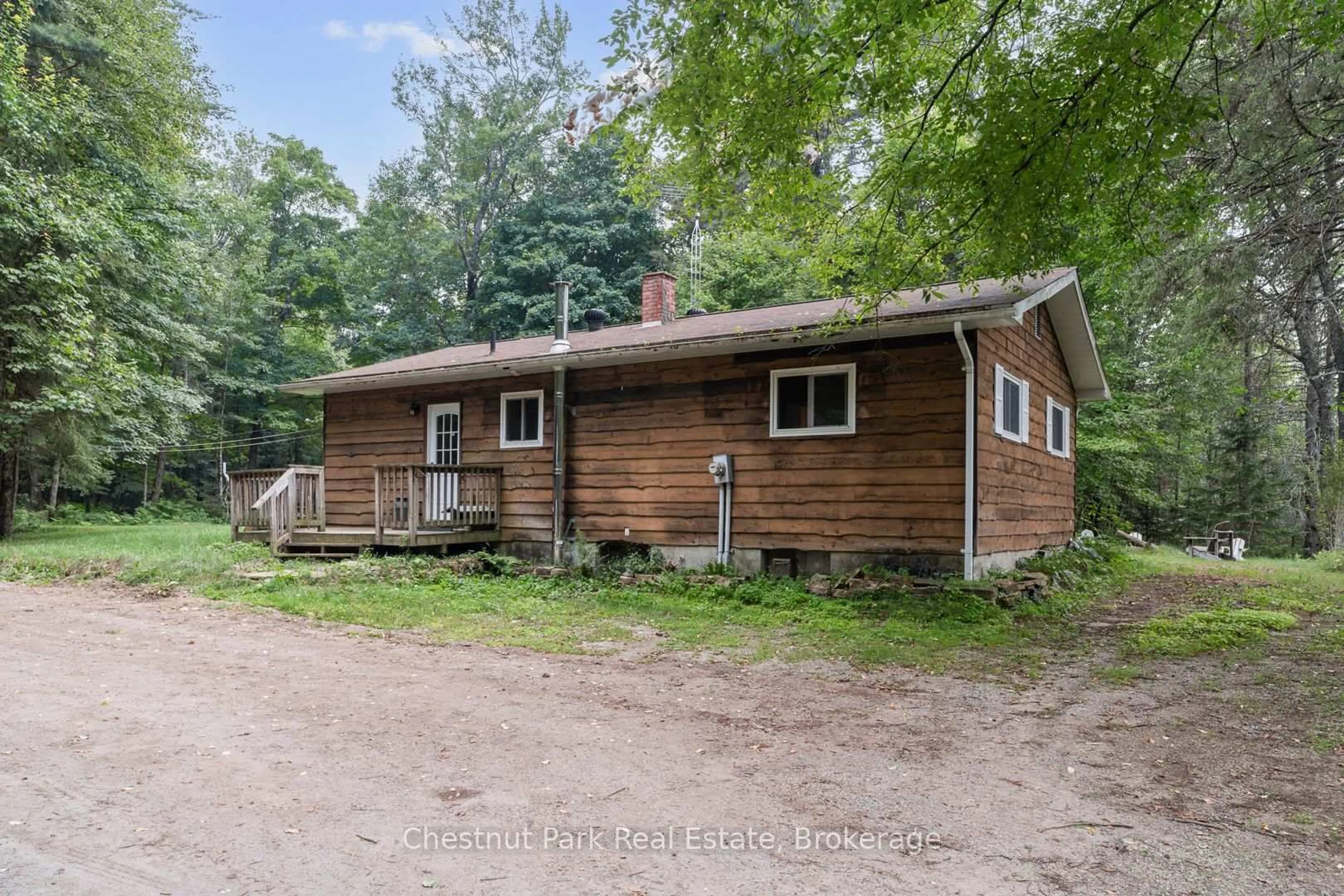 A pic from outside/outdoor area/front of a property/back of a property/a pic from drone, unknown for 59 Crockford Lane, Huntsville Ontario P0B 1L0