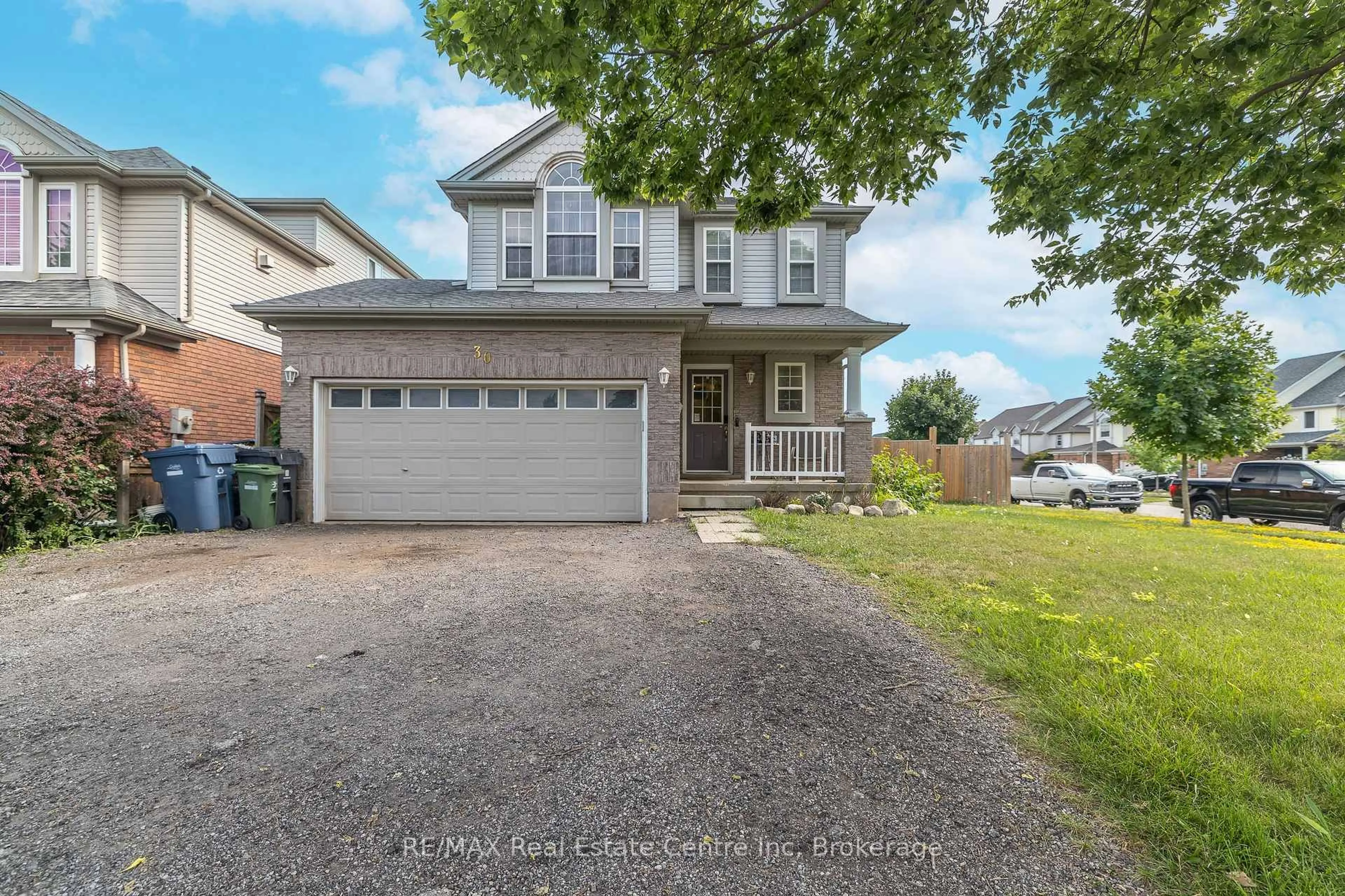 Home with vinyl exterior material, street for 30 O'connor Lane, Guelph Ontario N1E 7G4