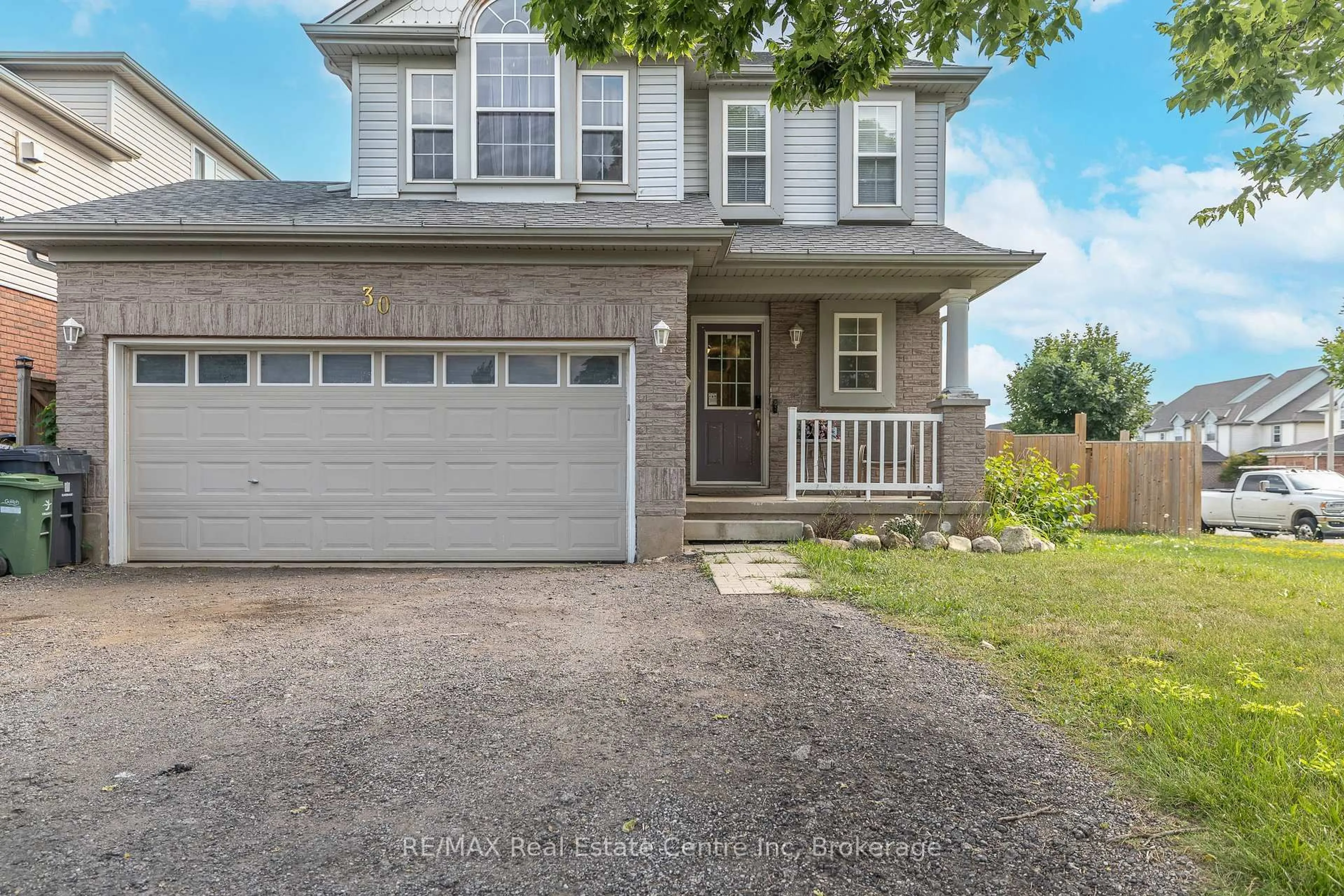 Home with vinyl exterior material, street for 30 O'connor Lane, Guelph Ontario N1E 7G4