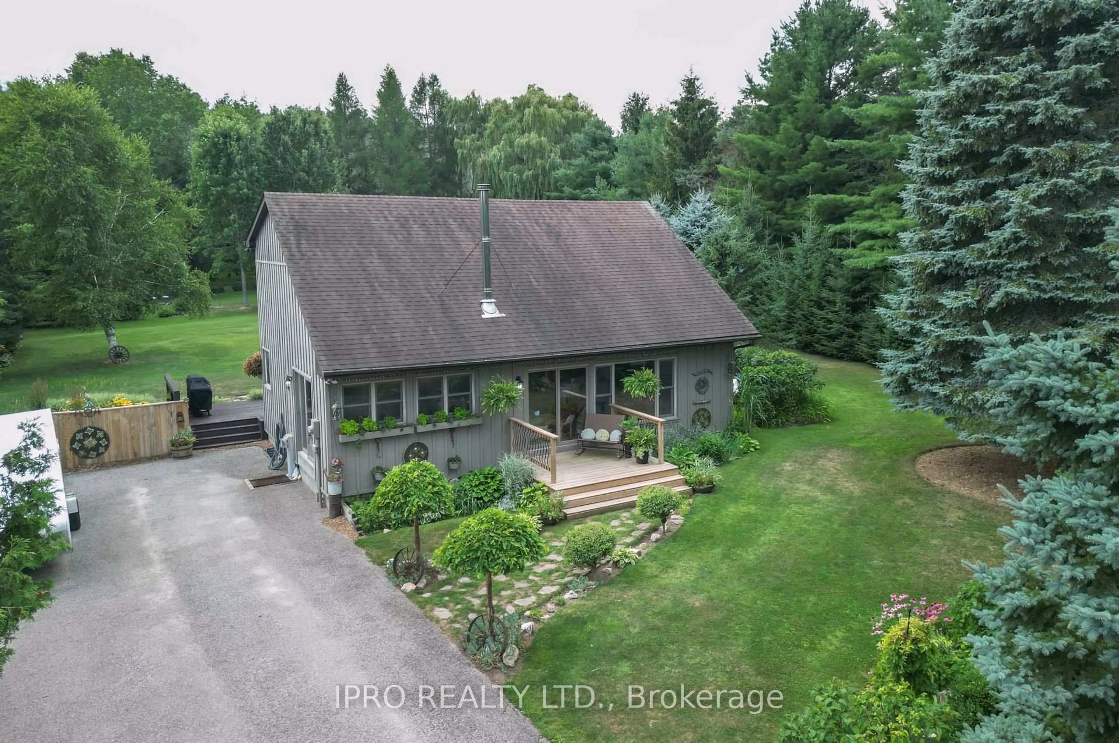 A pic from outside/outdoor area/front of a property/back of a property/a pic from drone, unknown for 5 Cook Cres, Mulmur Ontario L9V 3M4