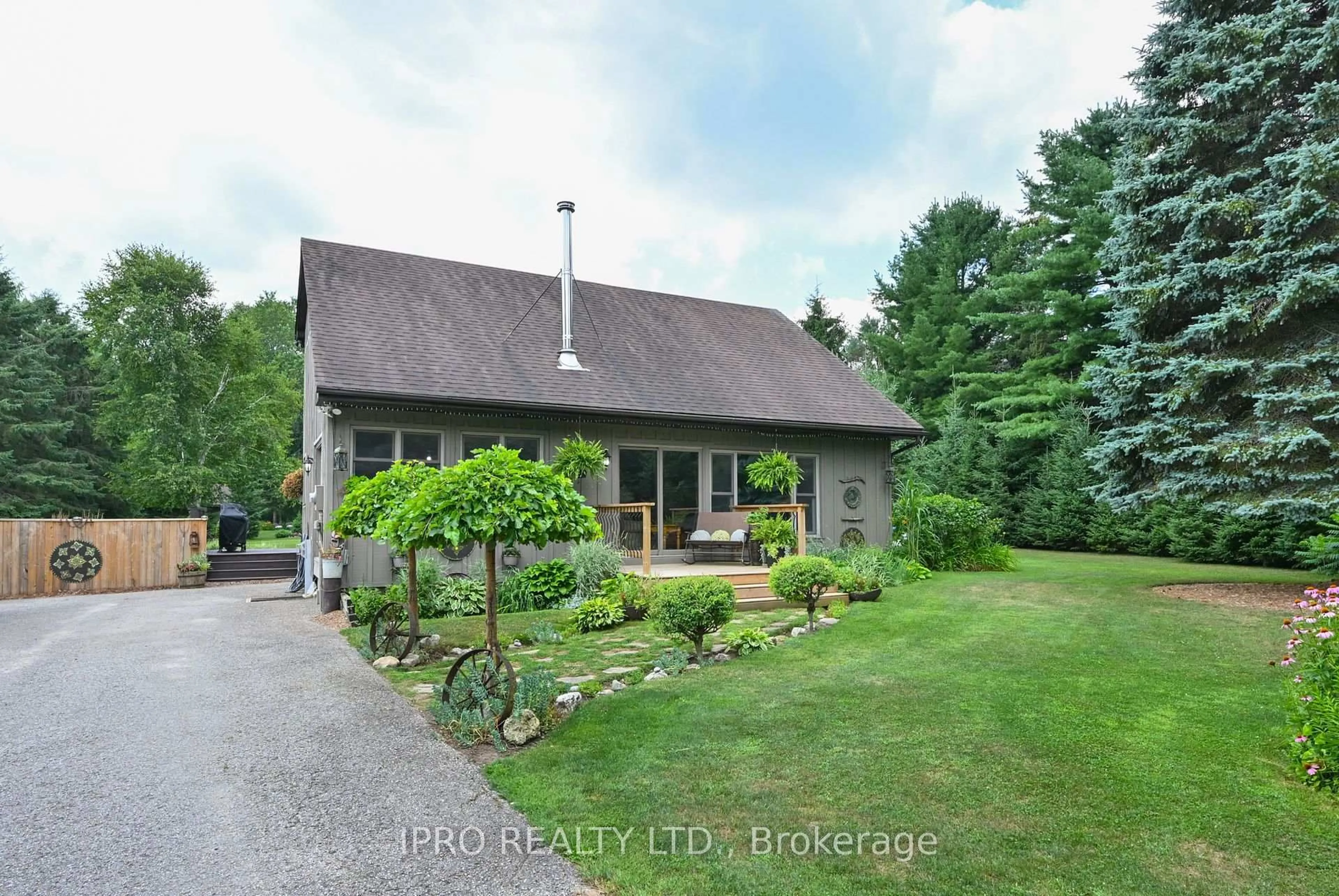 A pic from outside/outdoor area/front of a property/back of a property/a pic from drone, unknown for 5 Cook Cres, Mulmur Ontario L9V 3M4