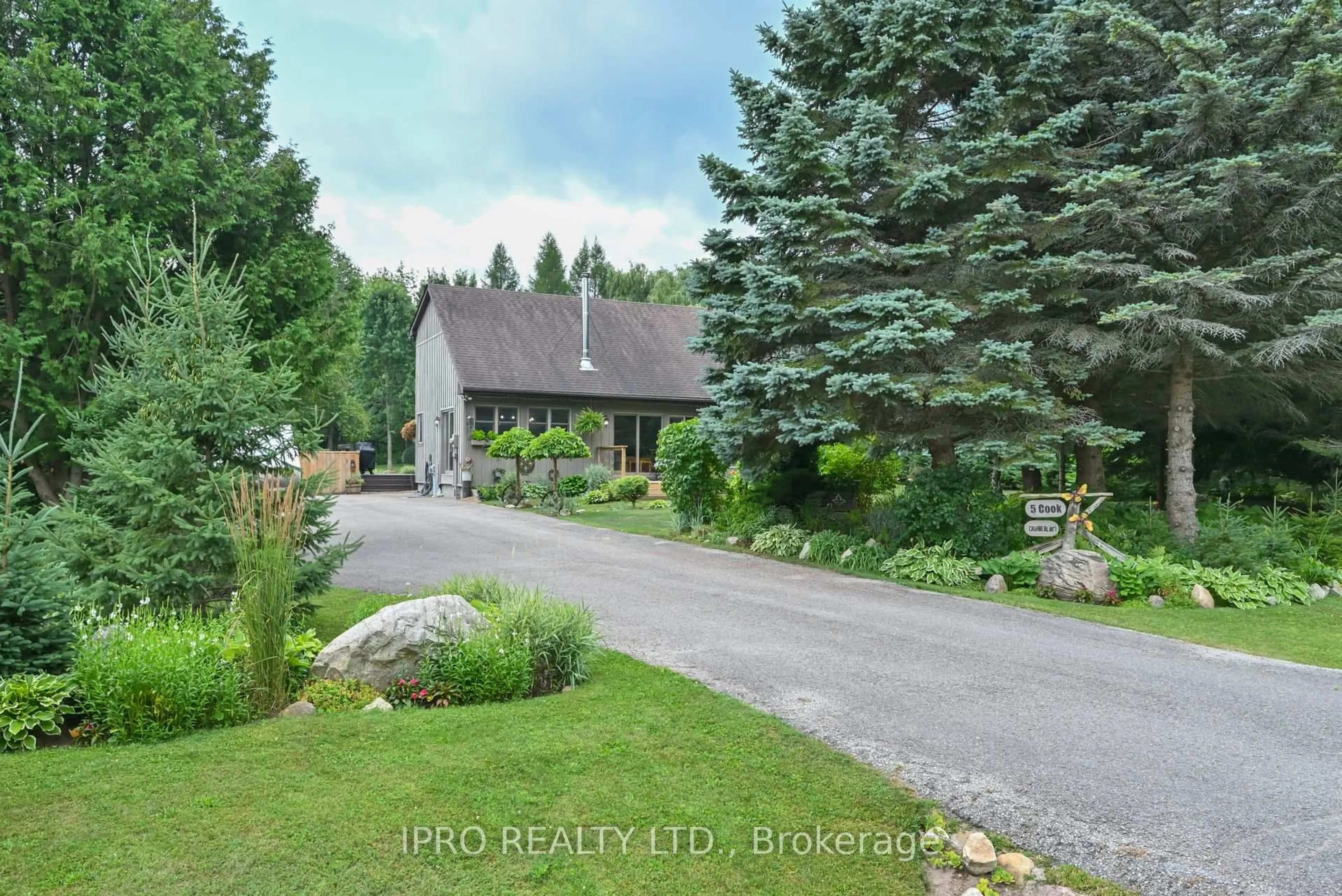 A pic from outside/outdoor area/front of a property/back of a property/a pic from drone, unknown for 5 Cook Cres, Mulmur Ontario L9V 3M4