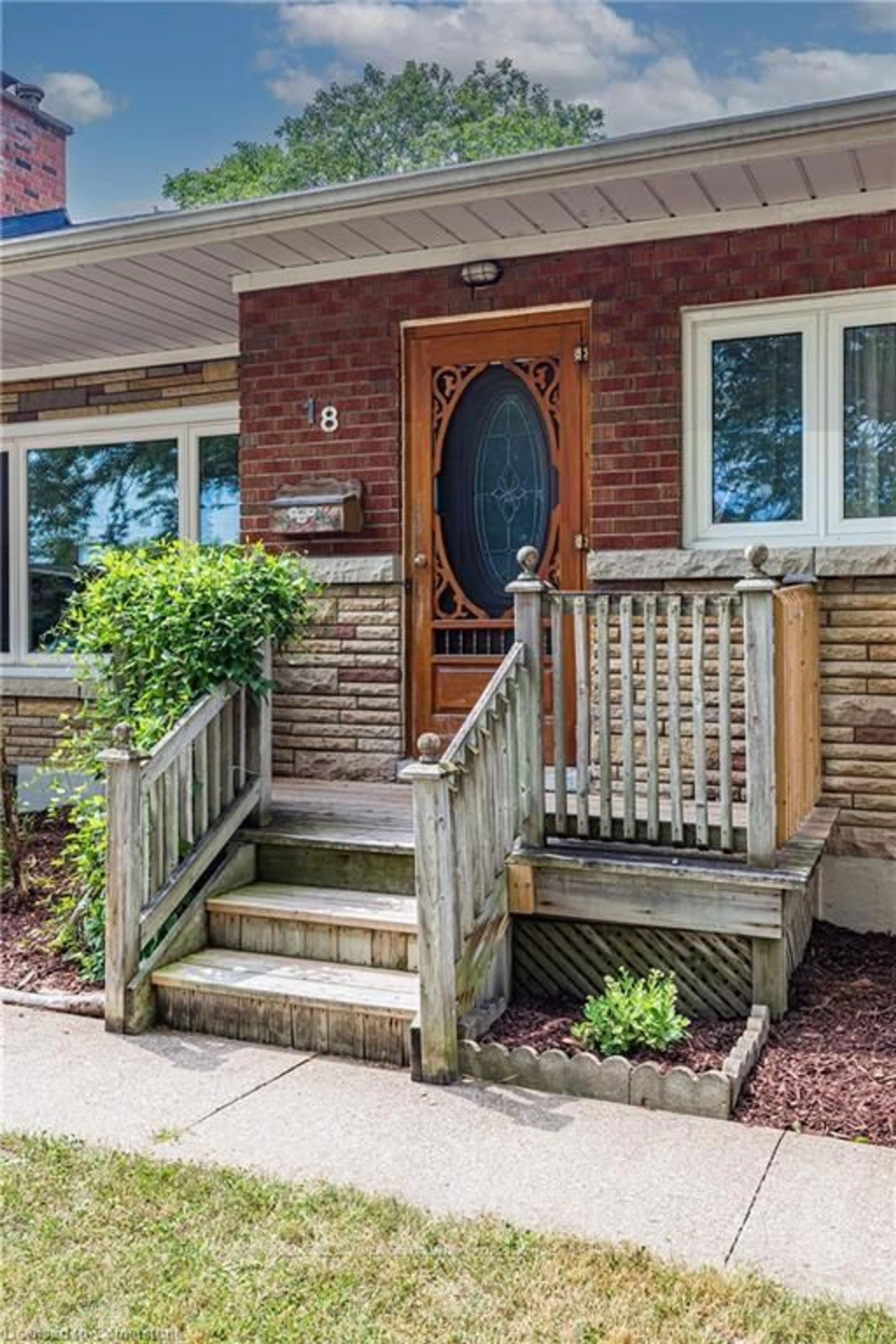 Home with brick exterior material, street for 18 Masterson Dr, St. Catharines Ontario L2T 3P1
