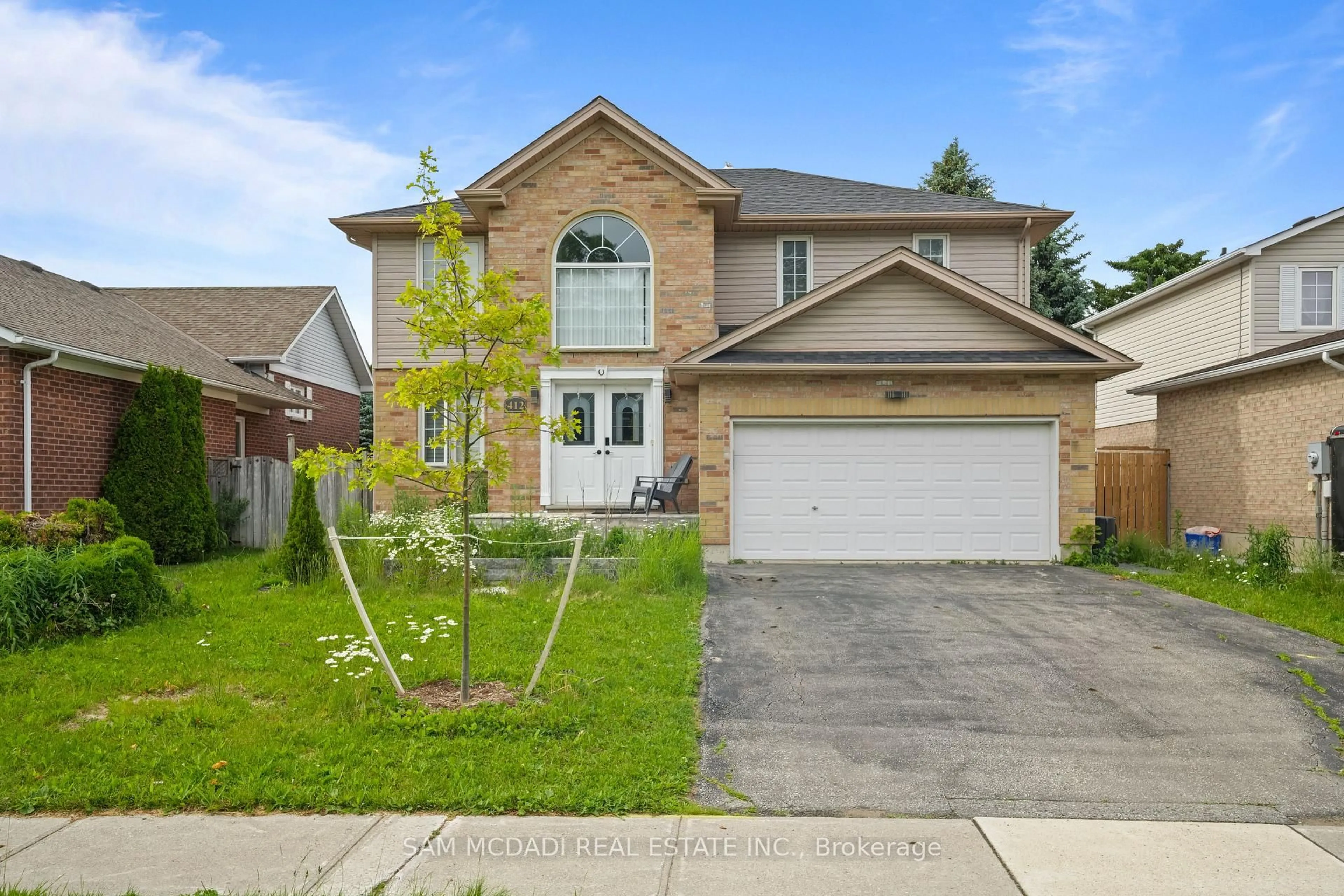 Home with brick exterior material, street for 412 Olde Village Lane, Shelburne Ontario L9V 3A4