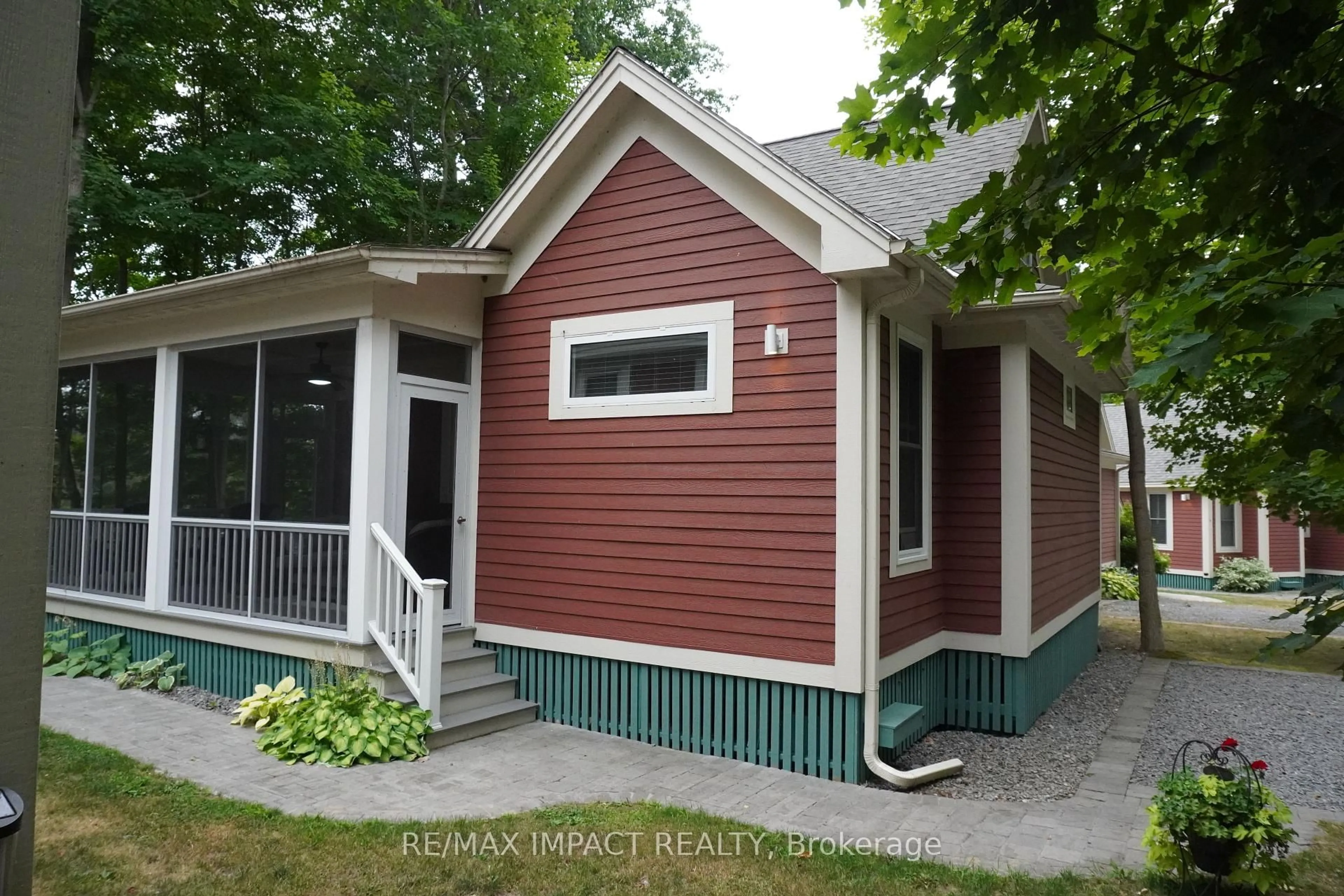 Home with vinyl exterior material, street for 8 Pine Forest Lane, Prince Edward County Ontario K0K 1P0