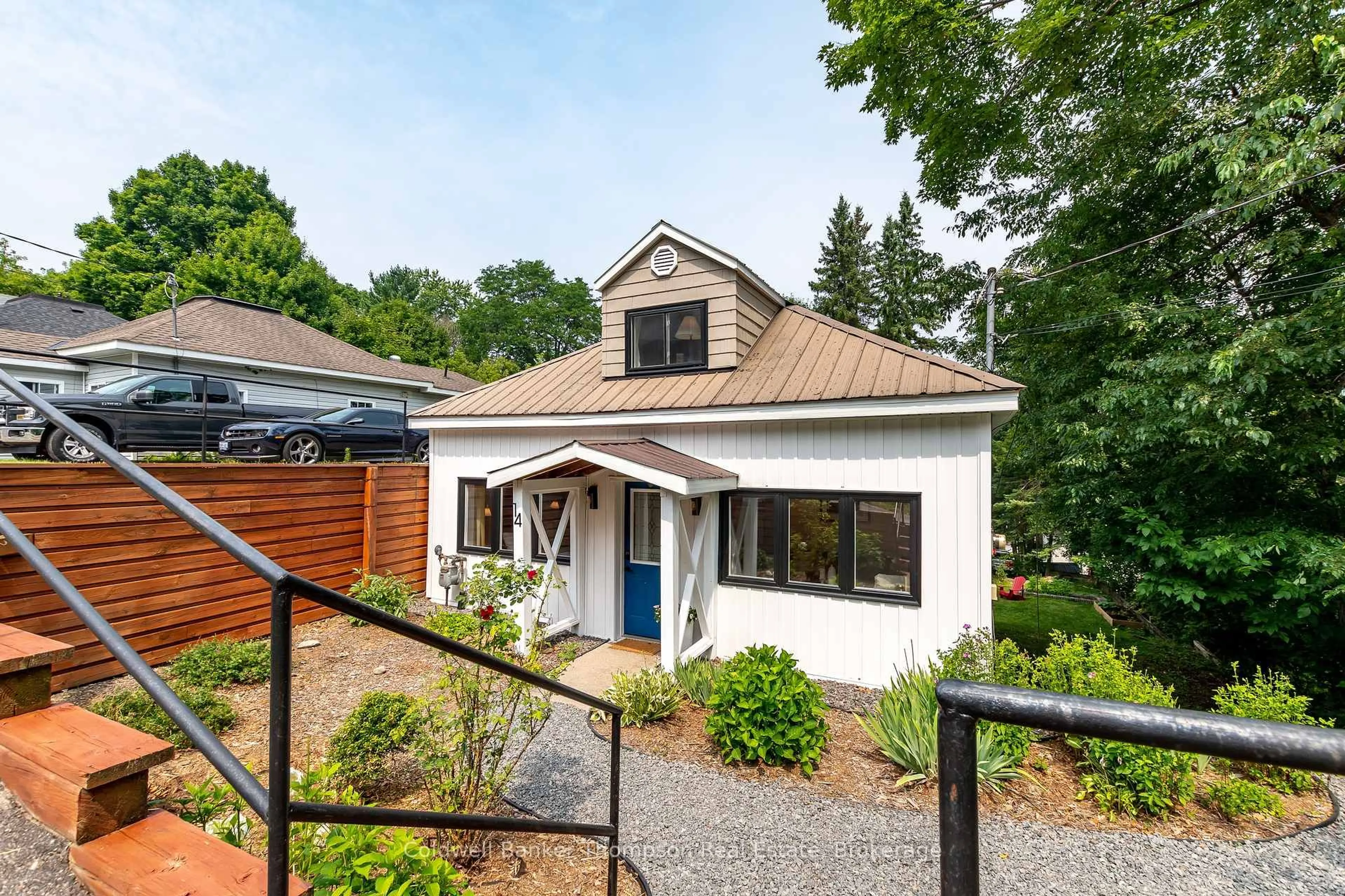 Home with brick exterior material, street for 14 Cora St, Huntsville Ontario P1H 1T5
