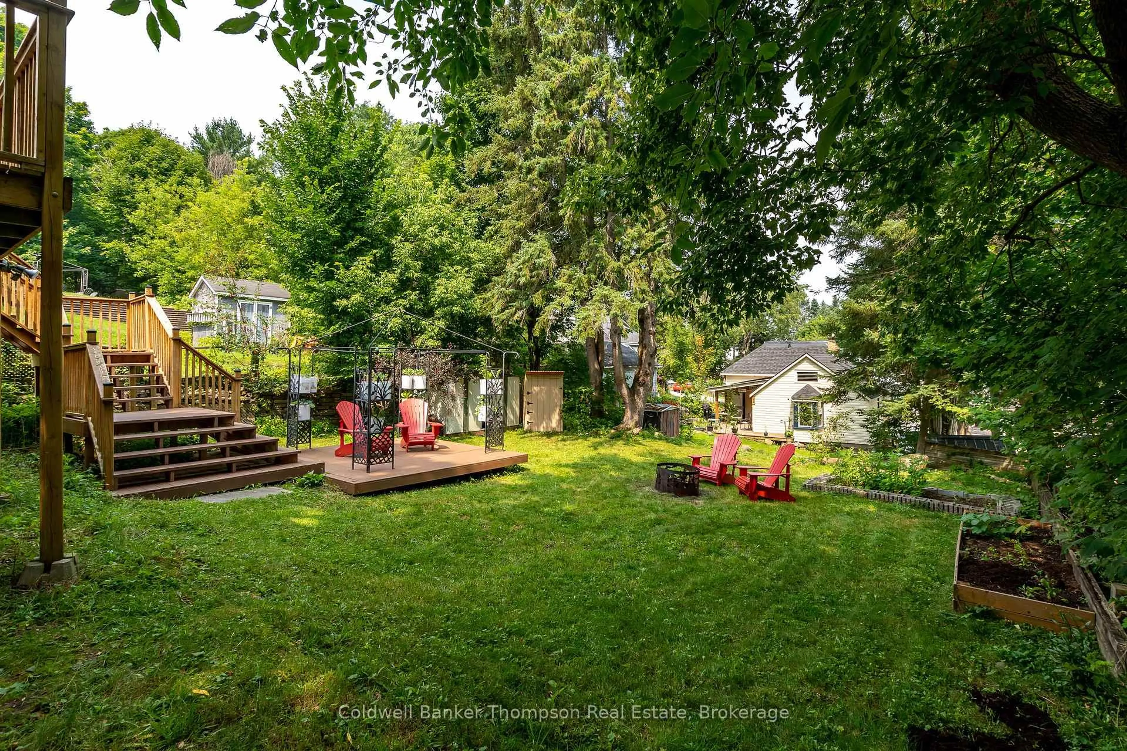 Patio, forest/trees view for 14 Cora St, Huntsville Ontario P1H 1T5