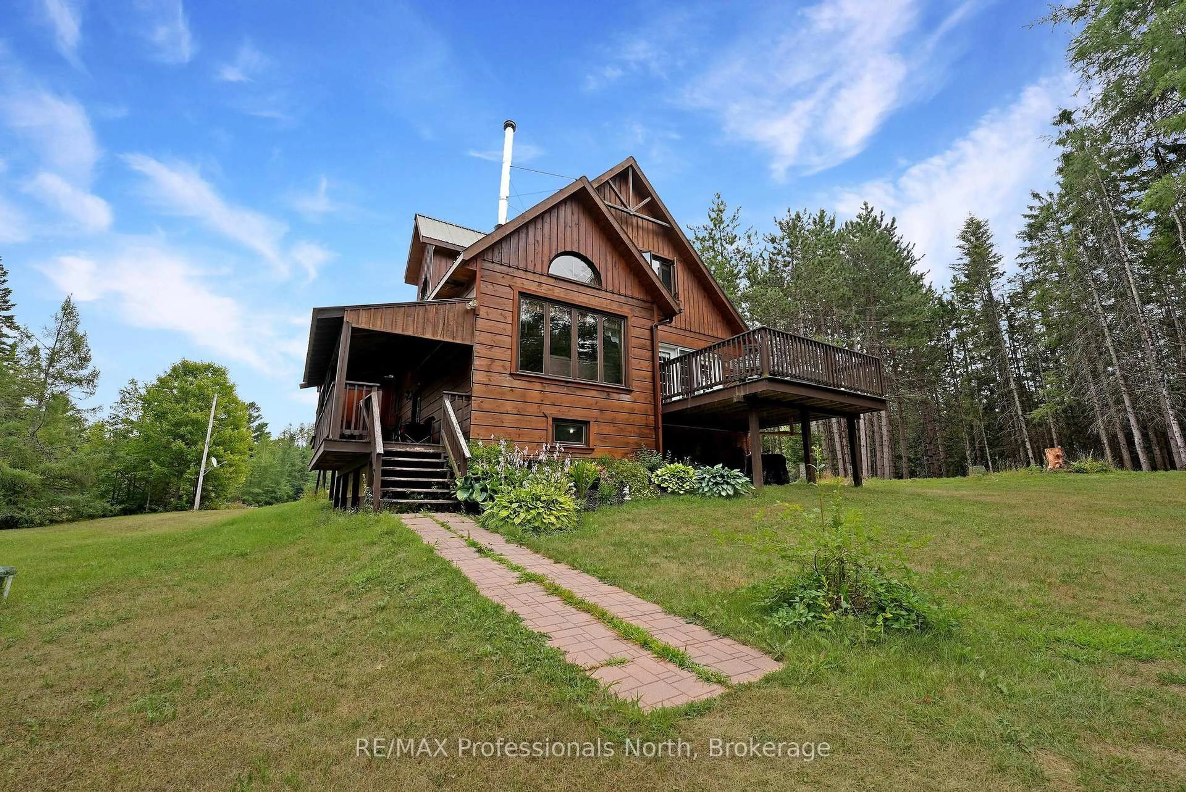 A pic from outside/outdoor area/front of a property/back of a property/a pic from drone, water/lake/river/ocean view for 1183 Conway Rd, Minden Hills Ontario K0M 2K0