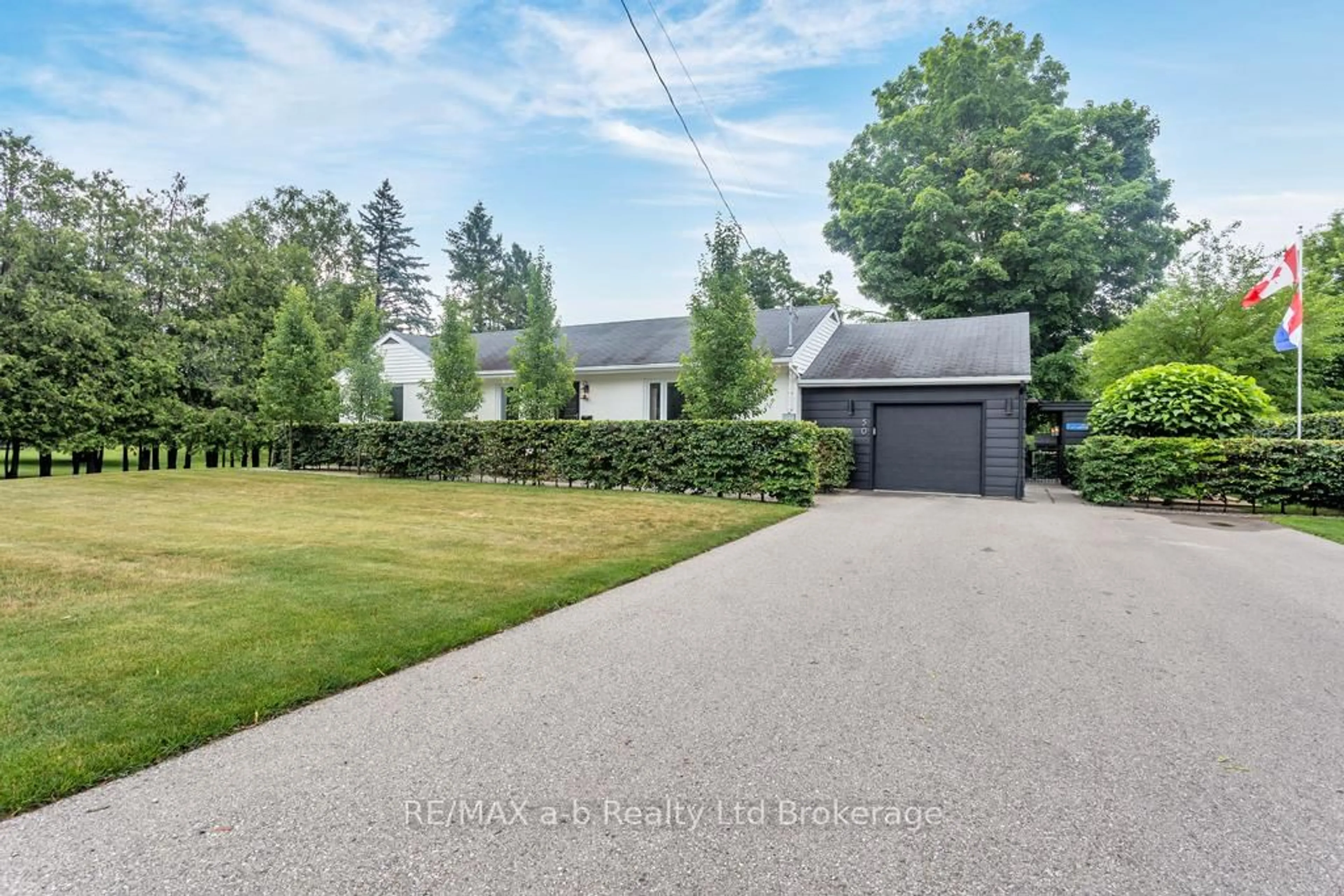 A pic from outside/outdoor area/front of a property/back of a property/a pic from drone, street for 50 MAIN St, Norwich Ontario N0J 1P0