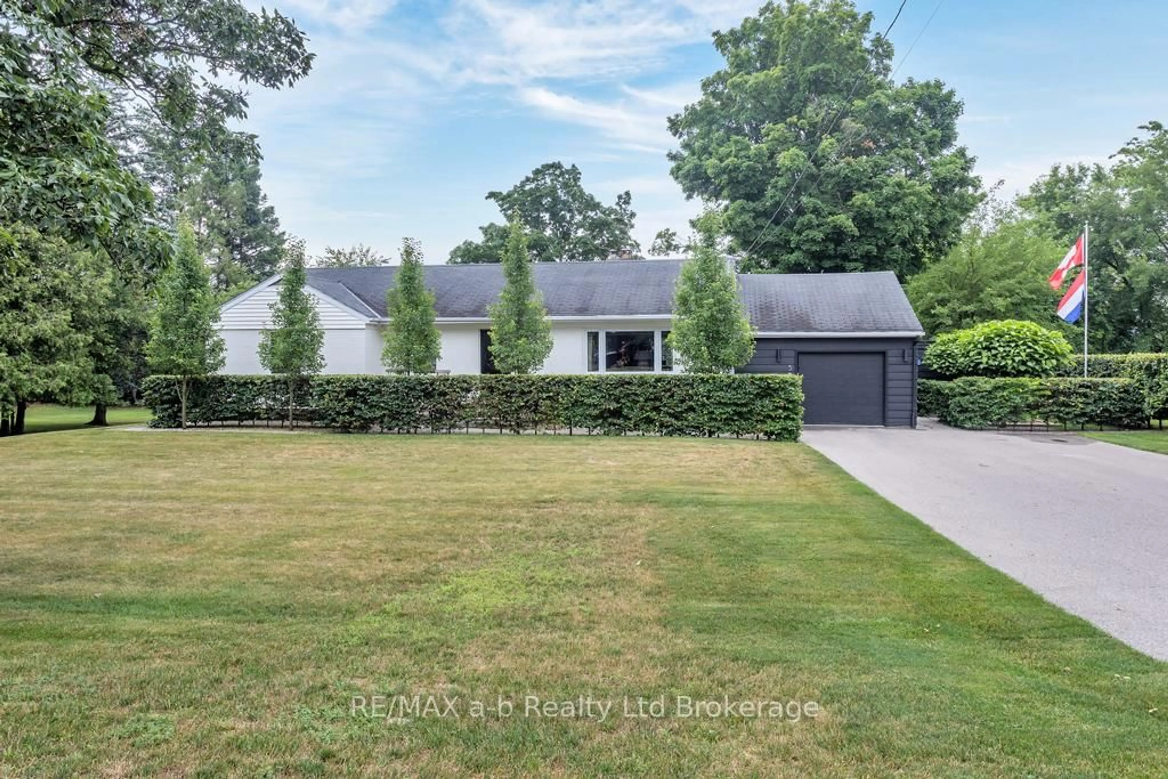 A pic from outside/outdoor area/front of a property/back of a property/a pic from drone, street for 50 MAIN St, Norwich Ontario N0J 1P0
