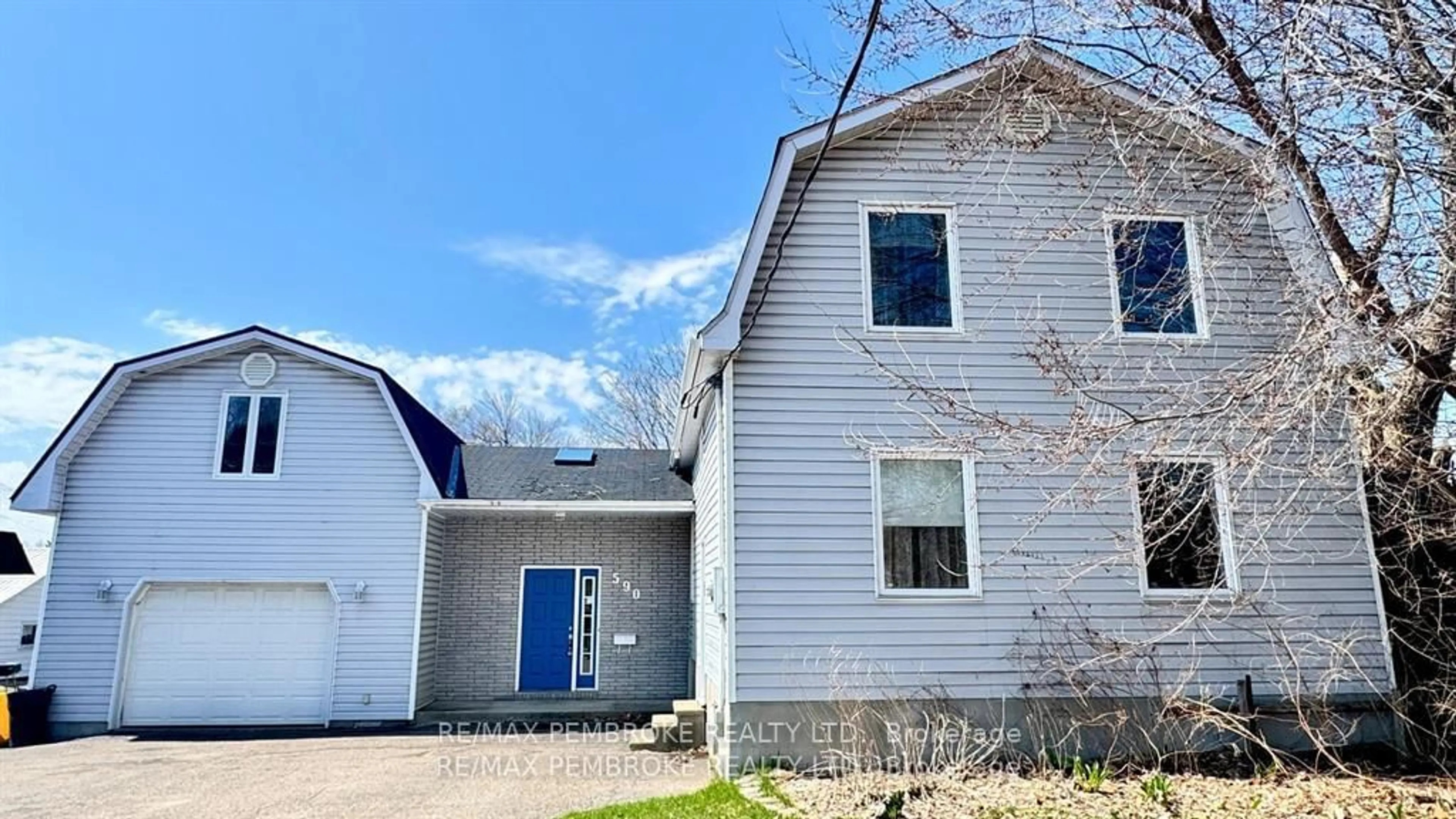 Home with vinyl exterior material, street for 590 Boundary Rd, Pembroke Ontario K8A 6M6