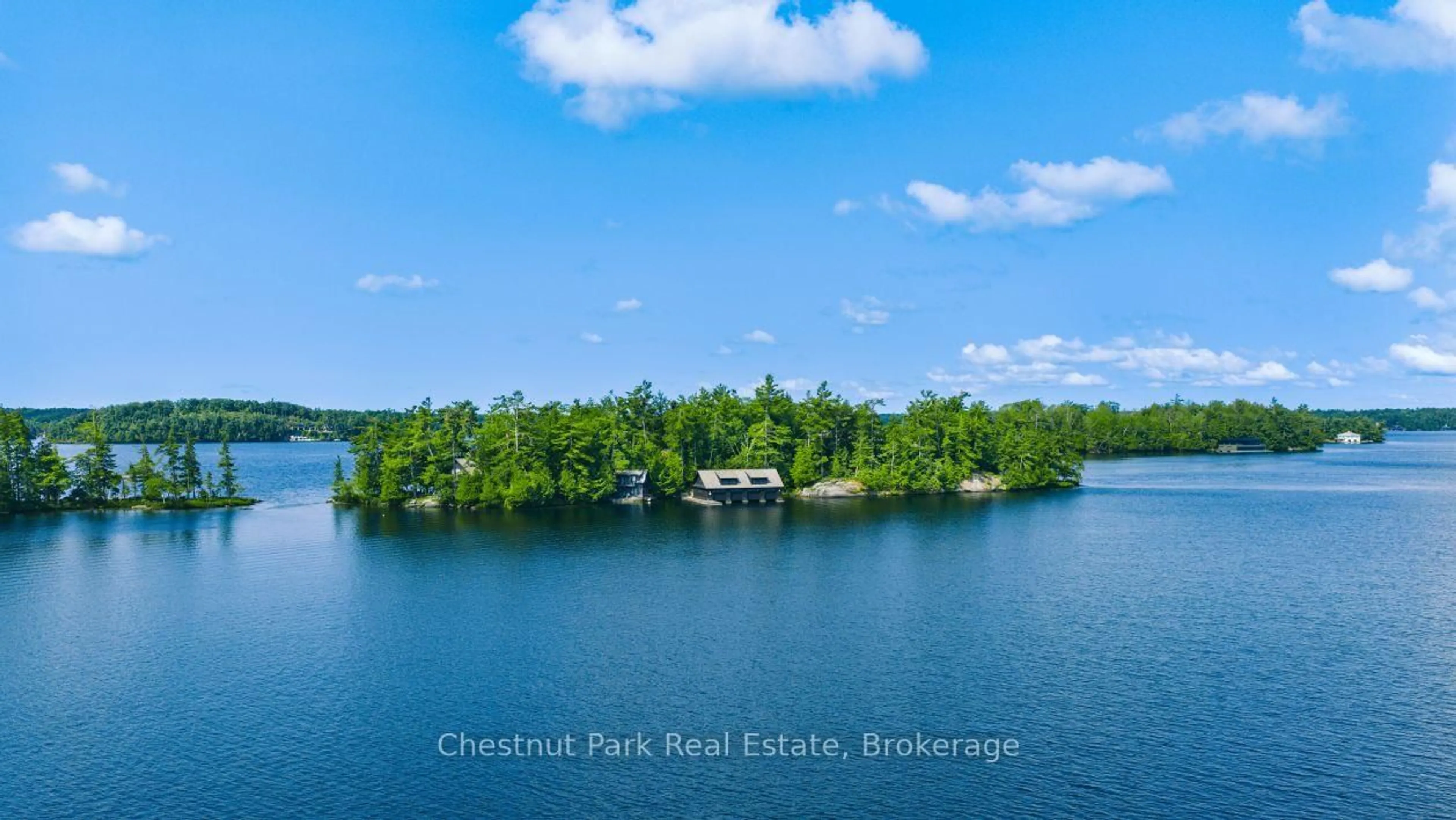 A pic from outside/outdoor area/front of a property/back of a property/a pic from drone, water/lake/river/ocean view for J24 Fawn & (Birch Islet) Island, Muskoka Lakes Ontario P0C 1J0