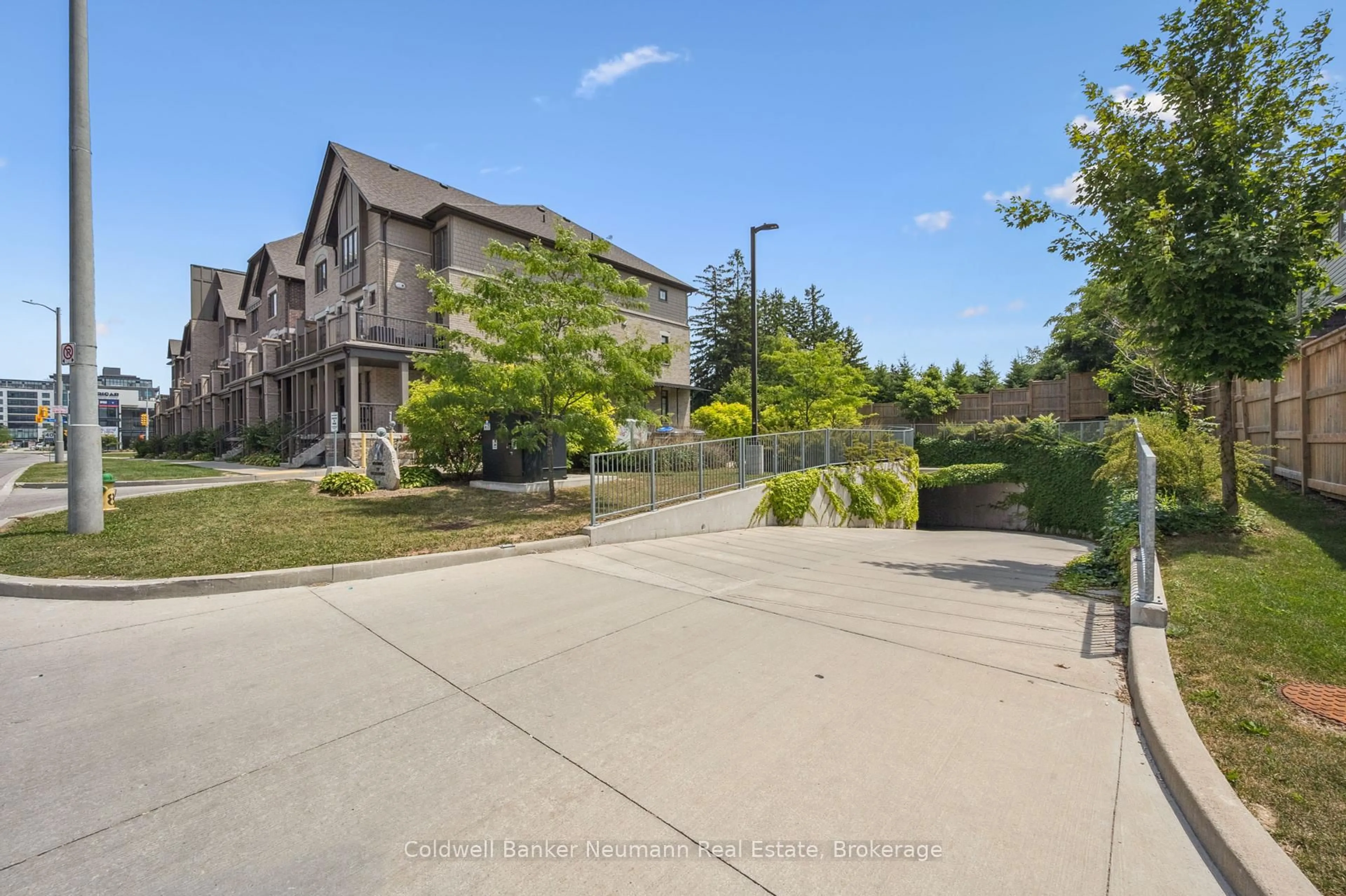 A pic from outside/outdoor area/front of a property/back of a property/a pic from drone, street for 333 Gosling Gdns #103, Guelph Ontario N1L 0K4