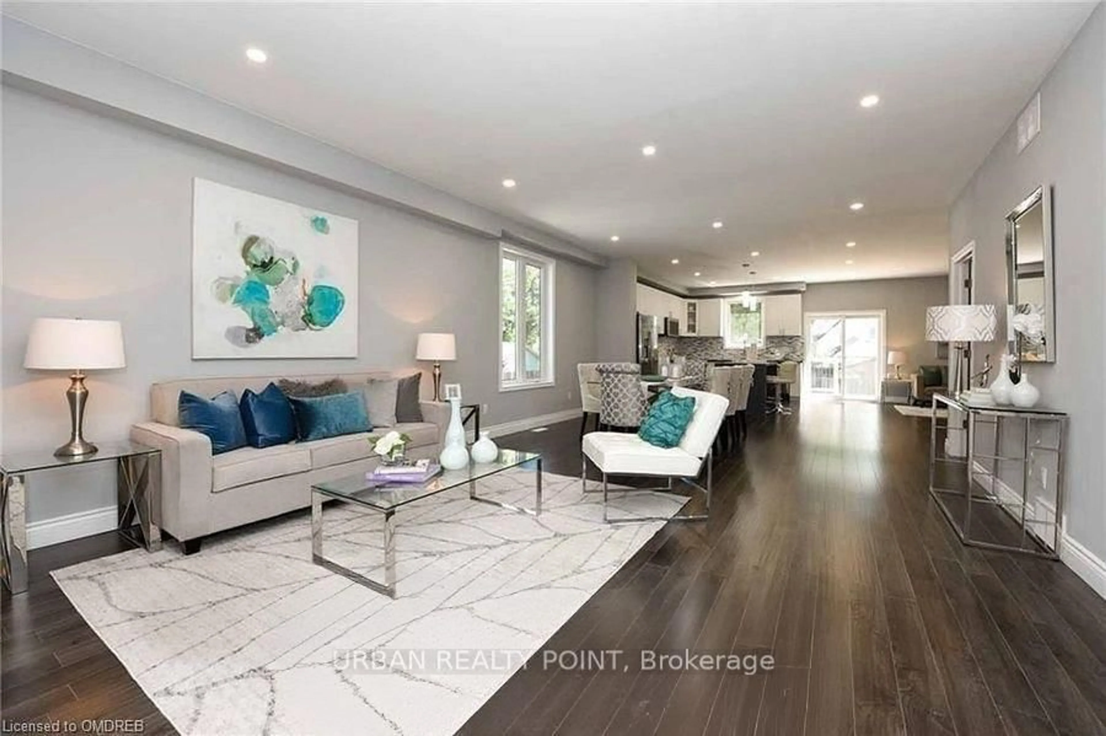 Living room with furniture, wood/laminate floor for 165 St Andrews St, Cambridge Ontario N1S 1N2