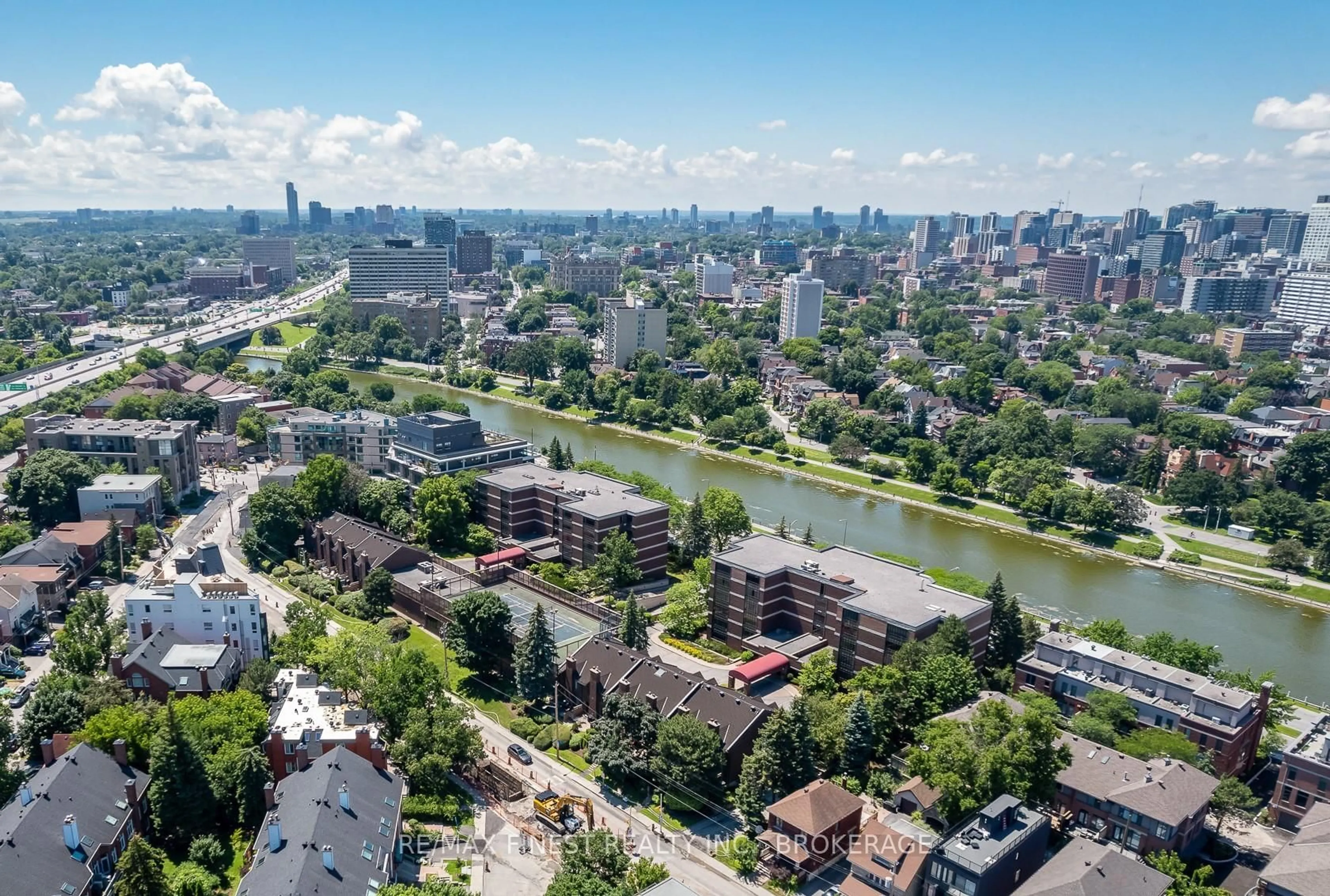 A pic from outside/outdoor area/front of a property/back of a property/a pic from drone, unknown for 111 ECHO Dr #5, Ottawa Ontario K1S 5K8
