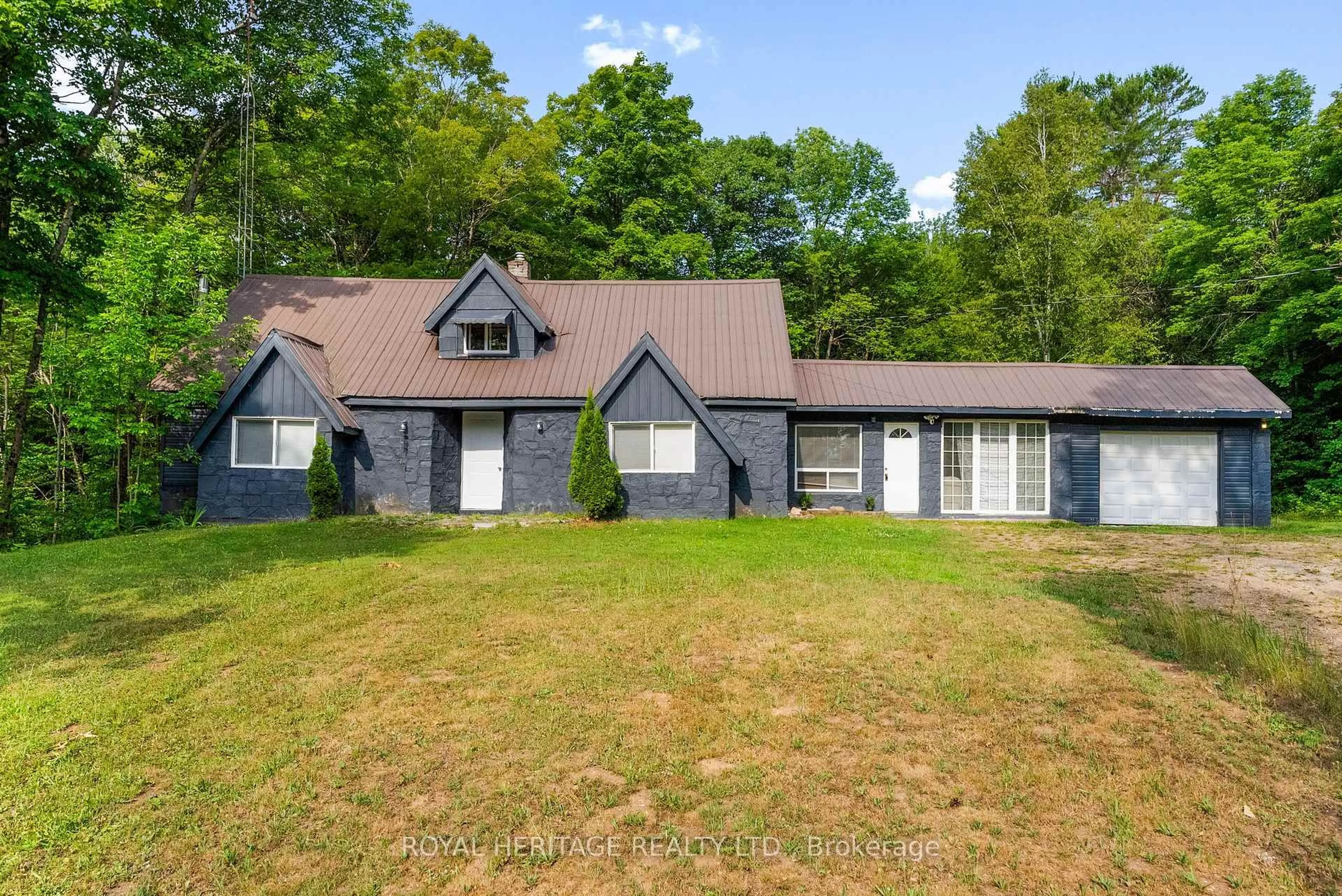 A pic from outside/outdoor area/front of a property/back of a property/a pic from drone, unknown for 17415 35 Highway, Algonquin Highlands Ontario K0M 2K0