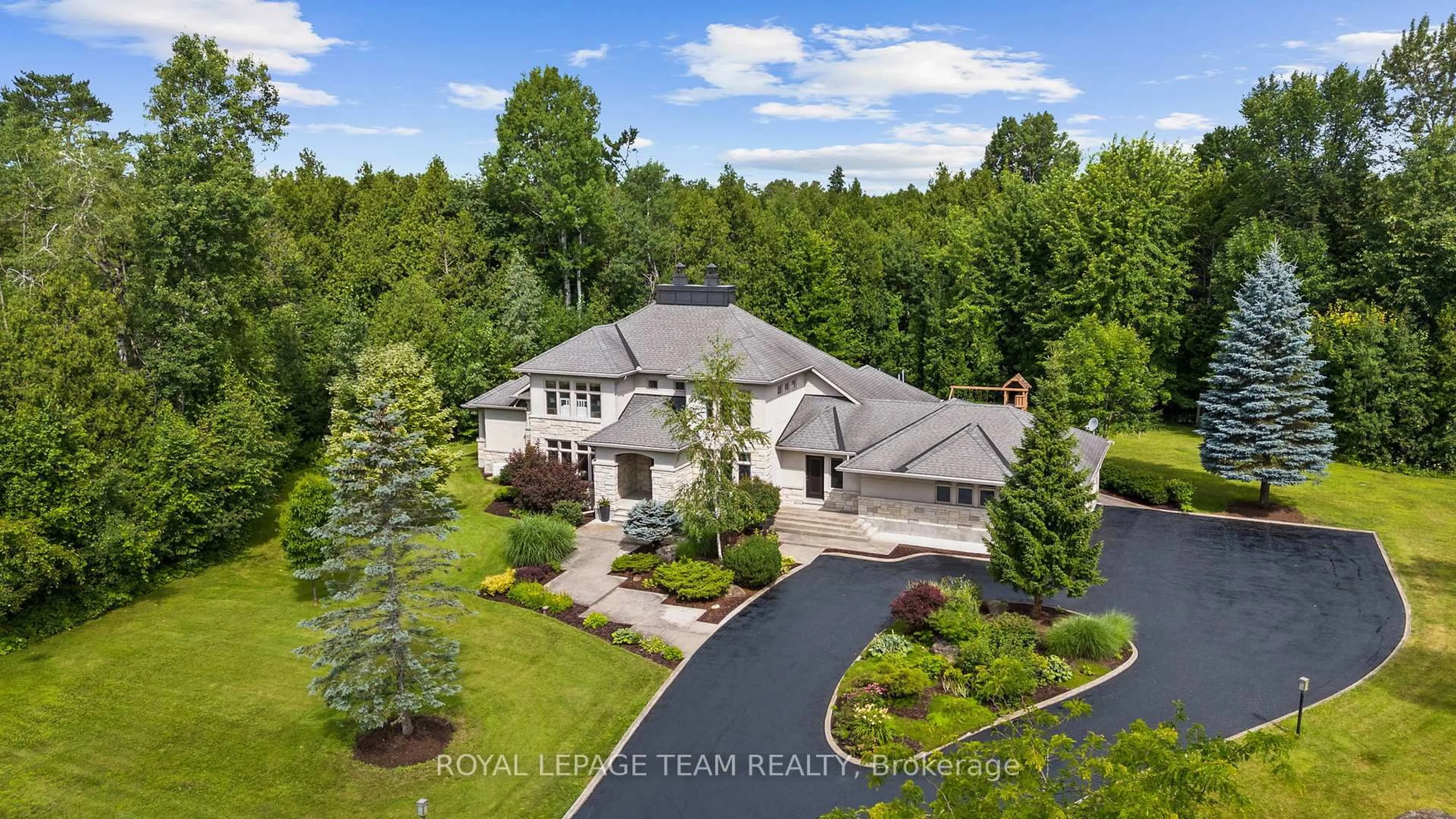 A pic from outside/outdoor area/front of a property/back of a property/a pic from drone, water/lake/river/ocean view for 5811 Longhearth Way, Ottawa Ontario K4M 1M2