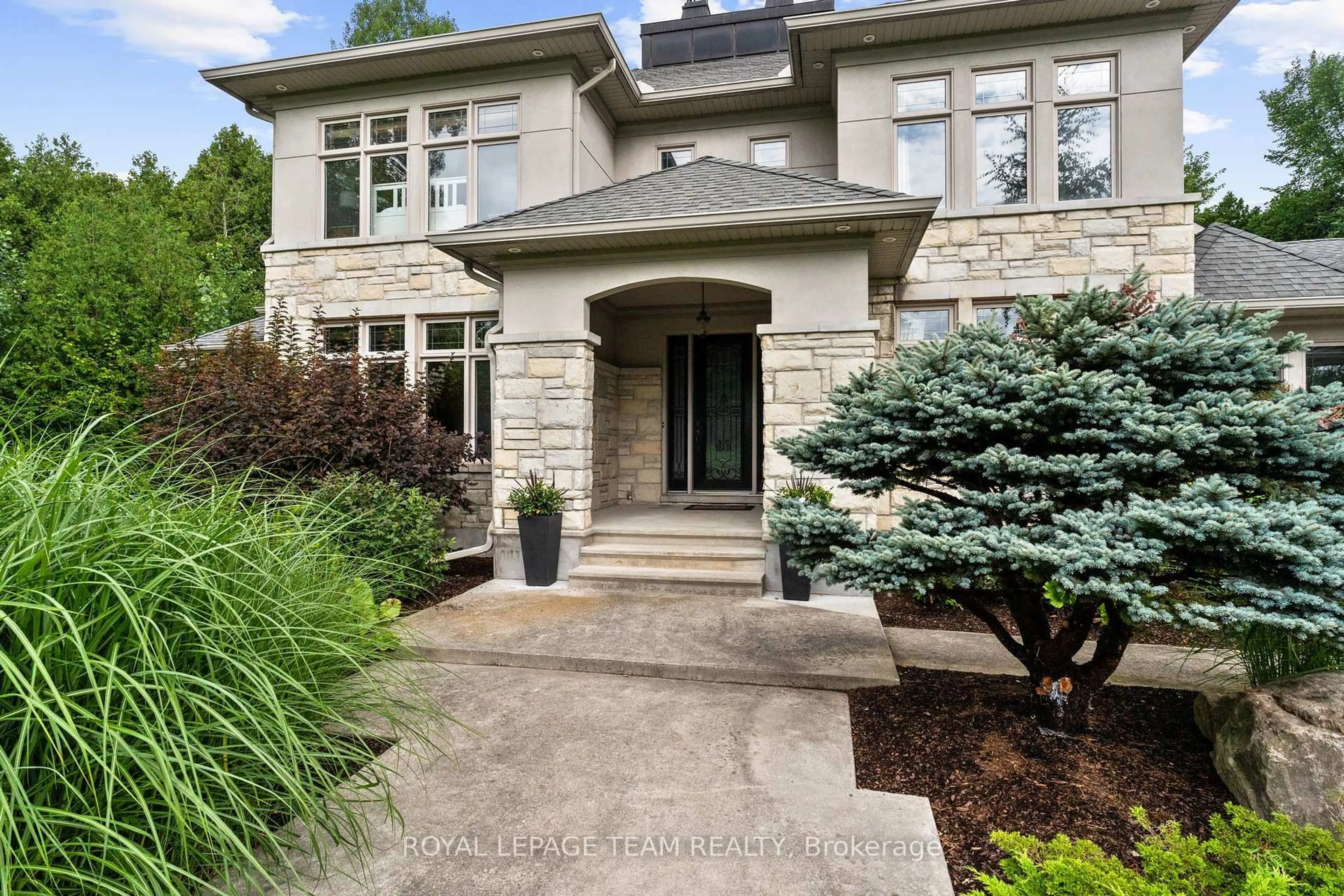 Home with brick exterior material, street for 5811 Longhearth Way, Ottawa Ontario K4M 1M2