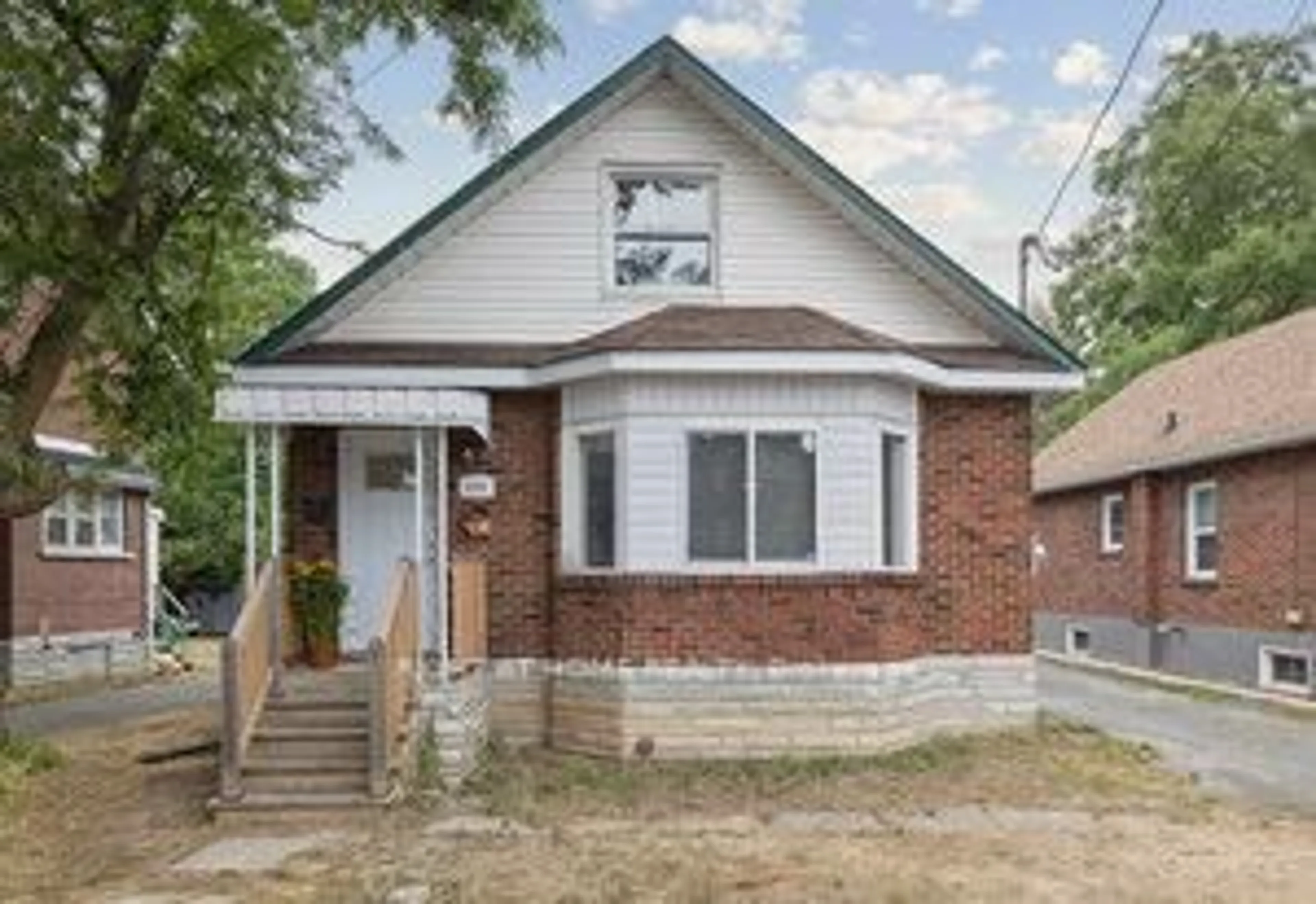 Home with brick exterior material, street for 1310 CLONSILLA Ave, Peterborough Central Ontario K9J 5Z2