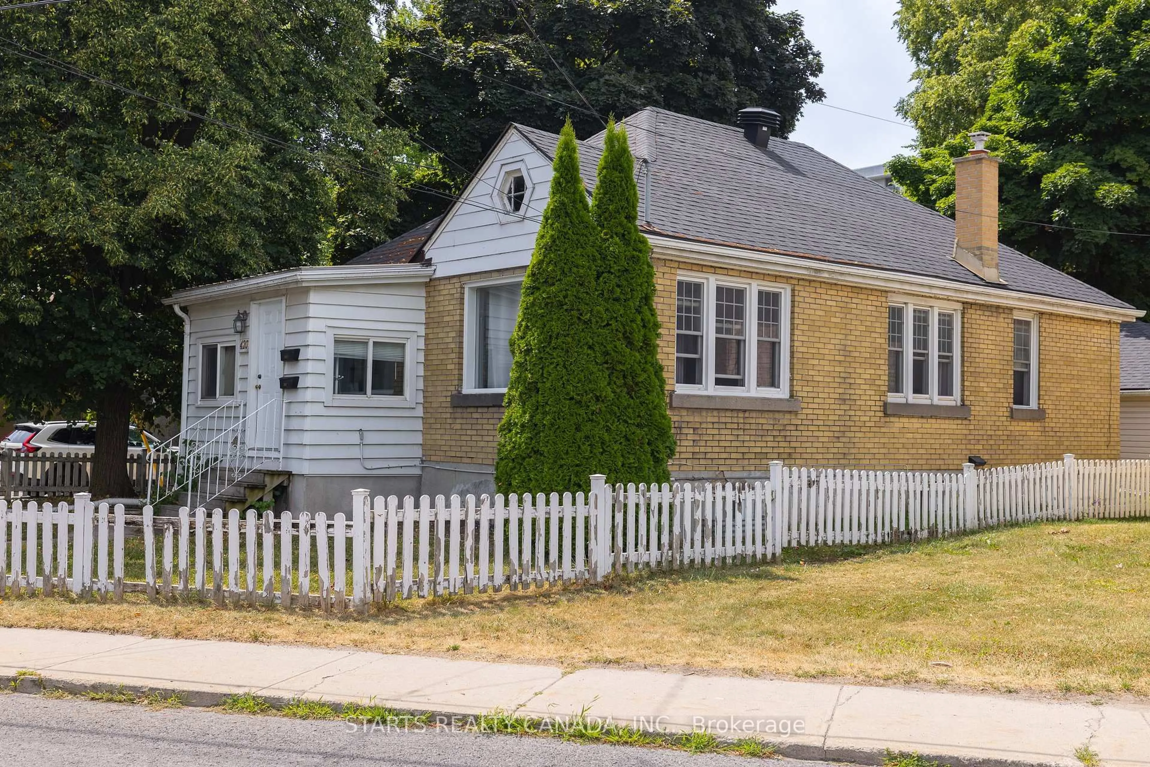 Home with vinyl exterior material, street for 420 Macdonnell St, Kingston Ontario K7L 4E4