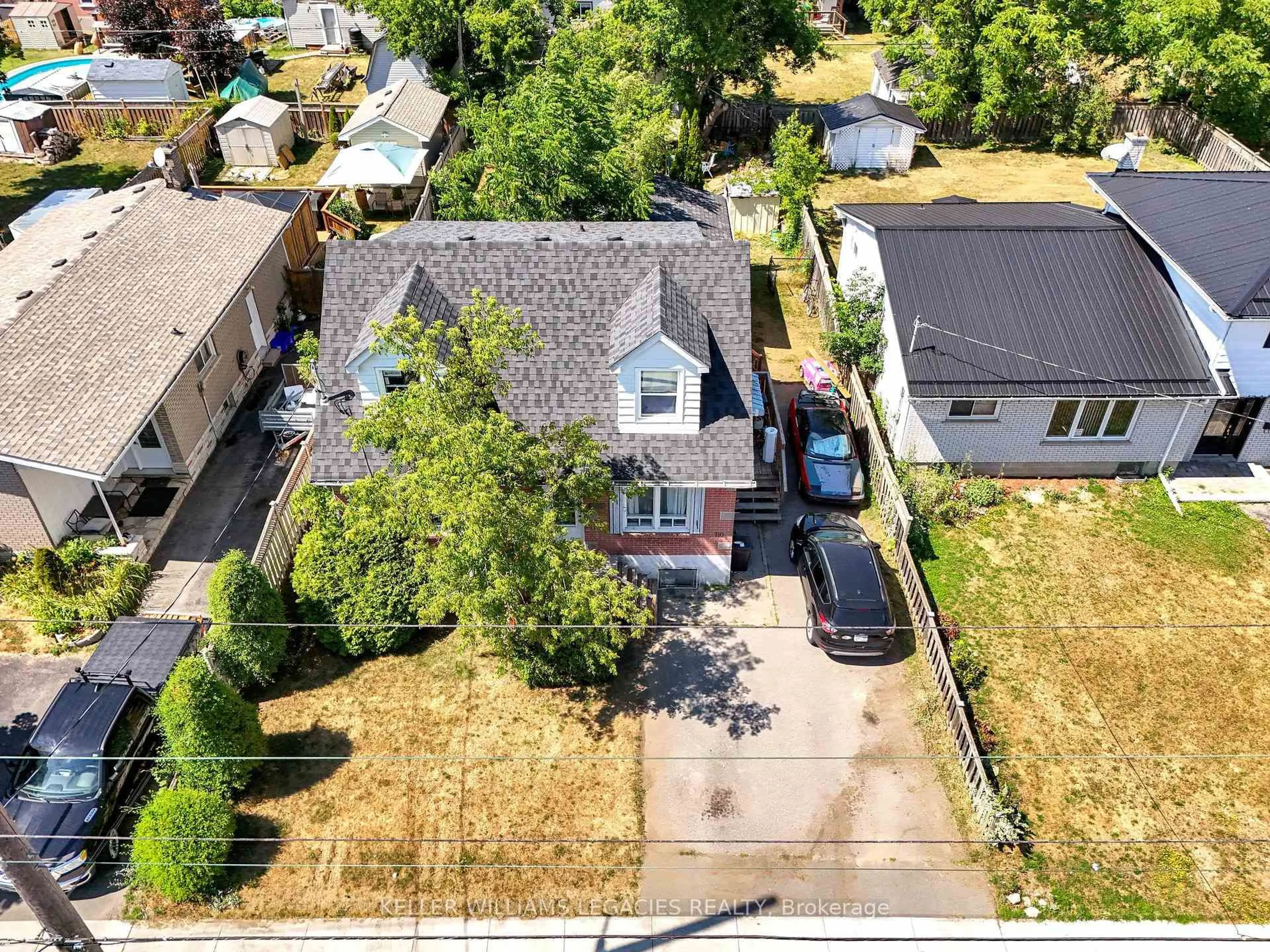 A pic from outside/outdoor area/front of a property/back of a property/a pic from drone, street for 710 CAMERON St, Peterborough South Ontario K9J 3Z8