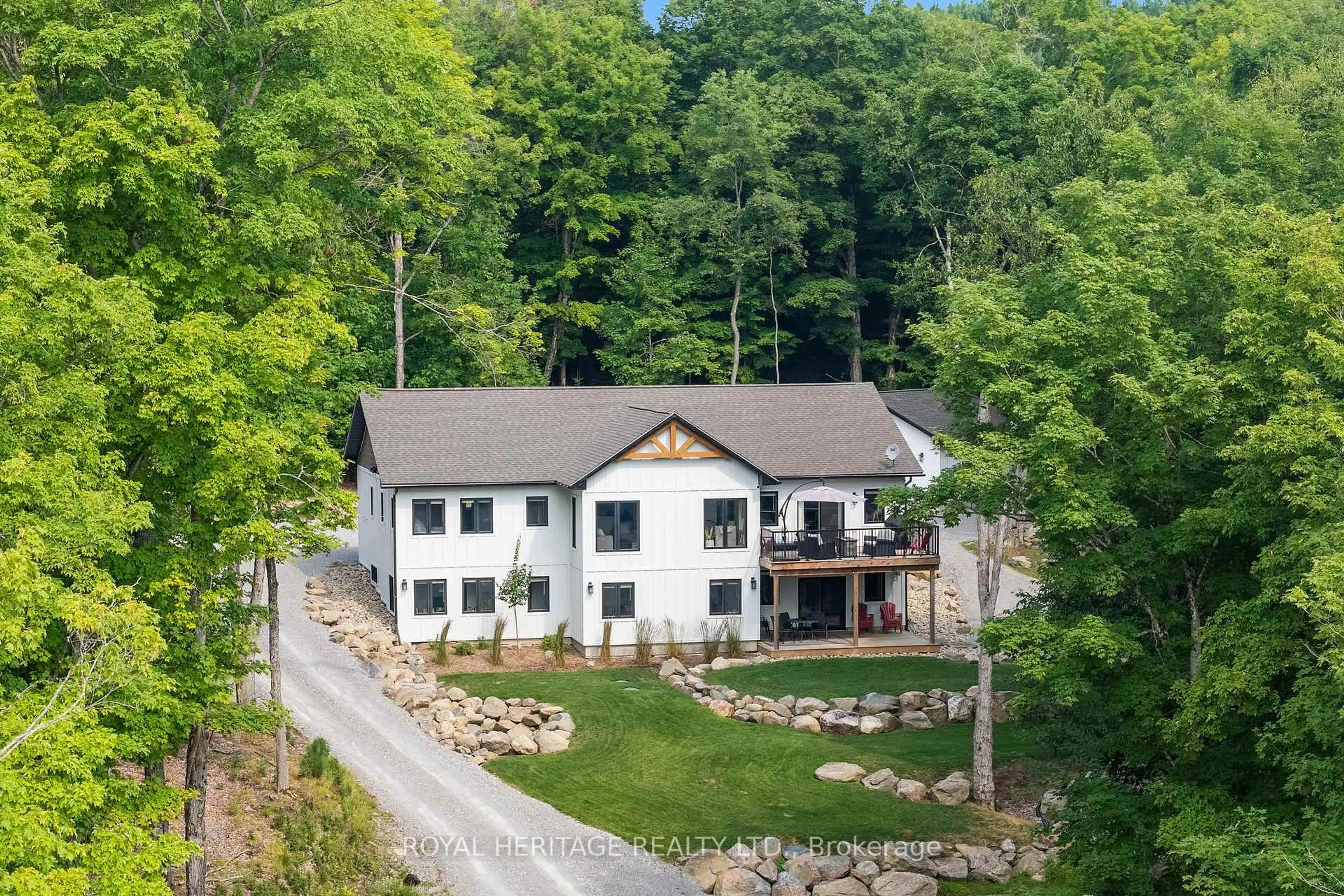 A pic from outside/outdoor area/front of a property/back of a property/a pic from drone, unknown for 51 Glebe Rd, Dysart et al Ontario K0M 1S0