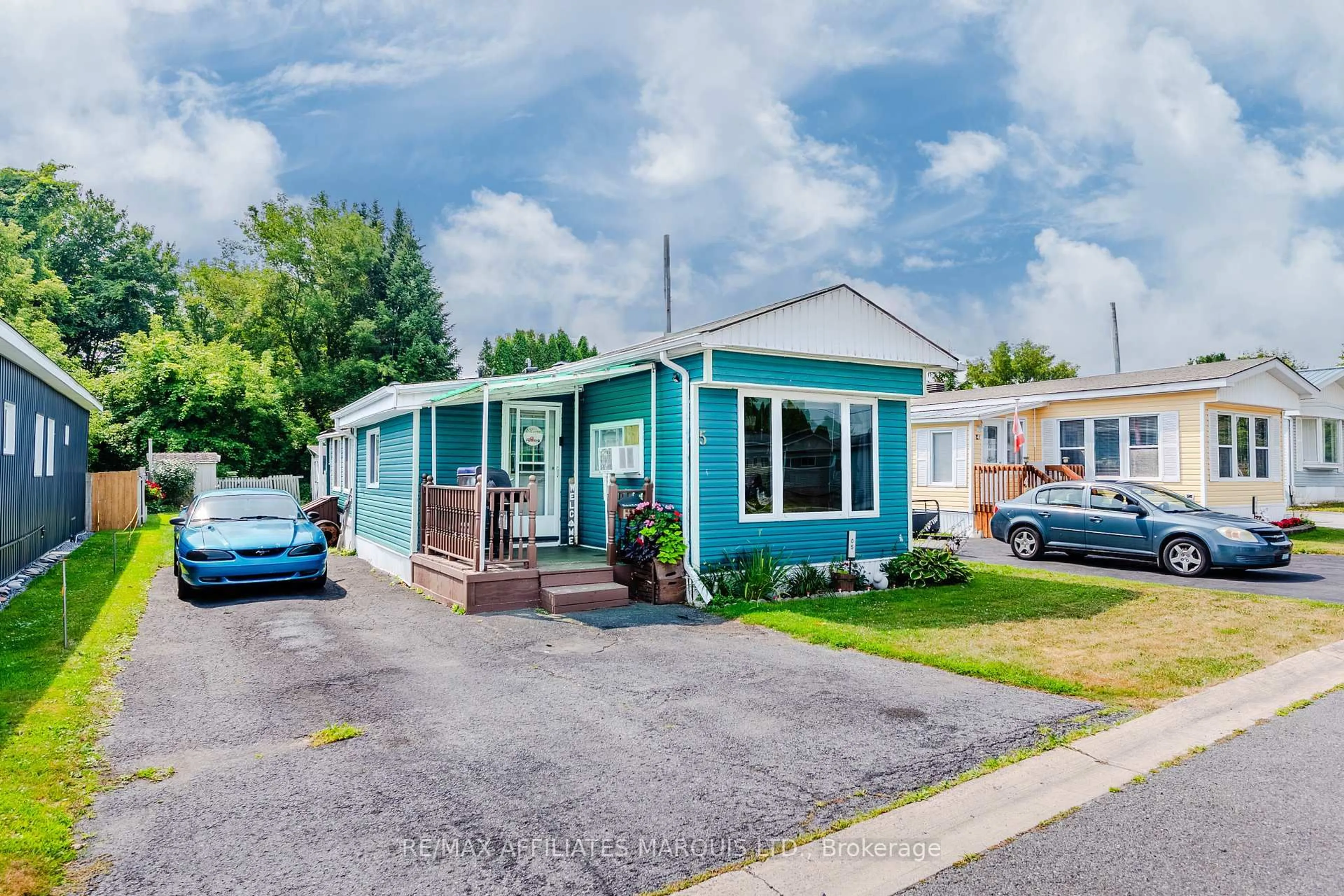 Home with vinyl exterior material, street for 2201 Power Dam Dr #Unit 5, Cornwall Ontario K6J 5W5