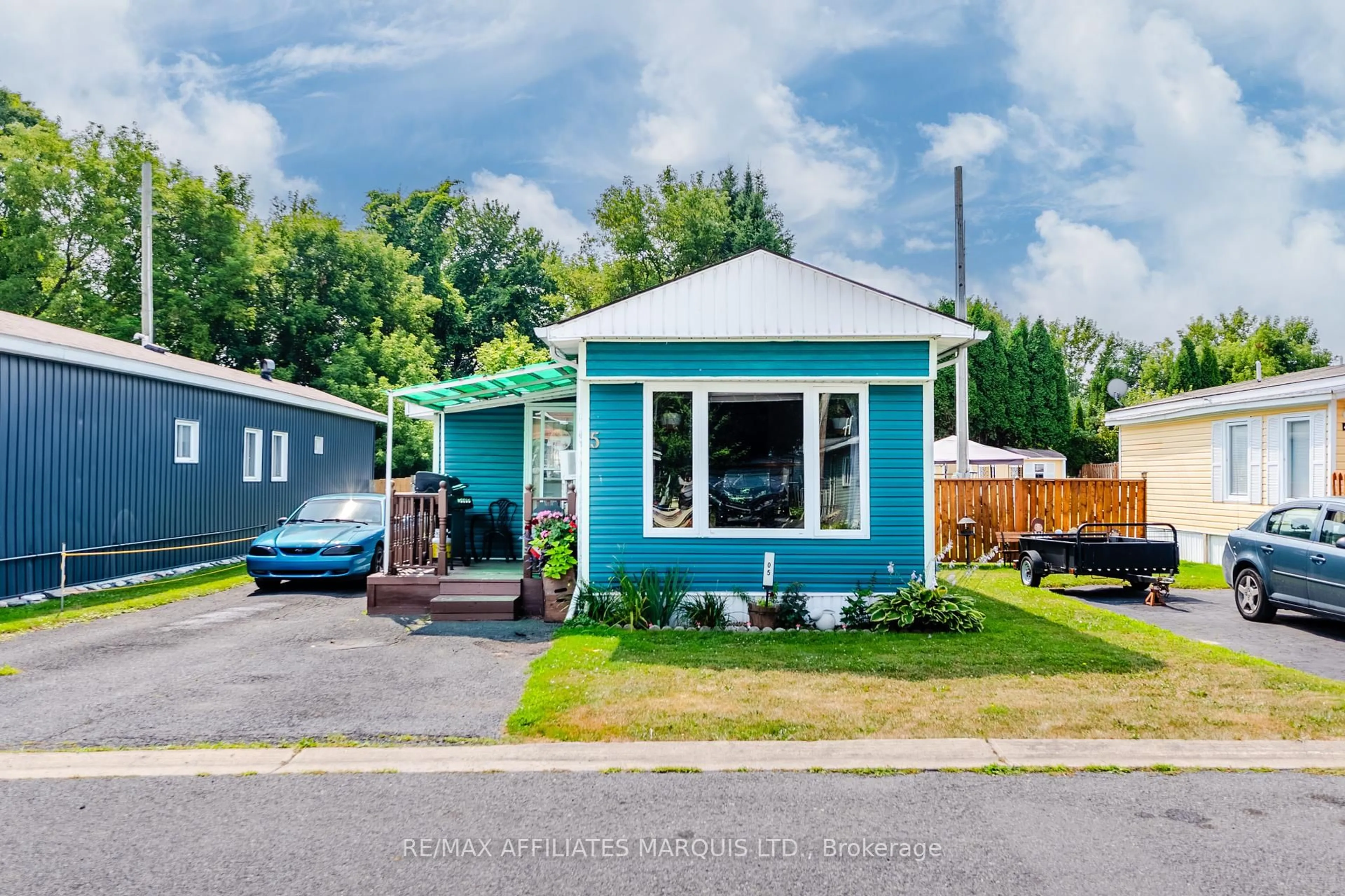 Home with vinyl exterior material, street for 2201 Power Dam Dr #Unit 5, Cornwall Ontario K6J 5W5