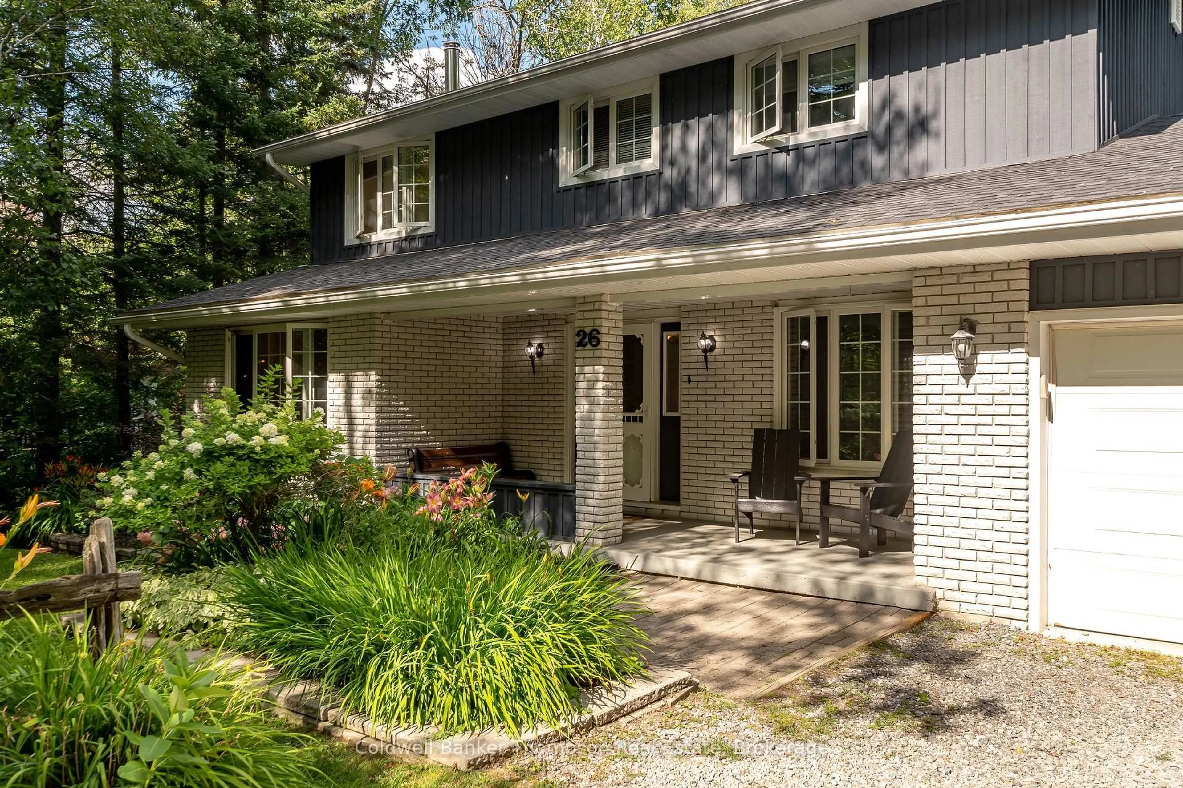 Home with brick exterior material, street for 26 Helen St, Huntsville Ontario P1H 1H5