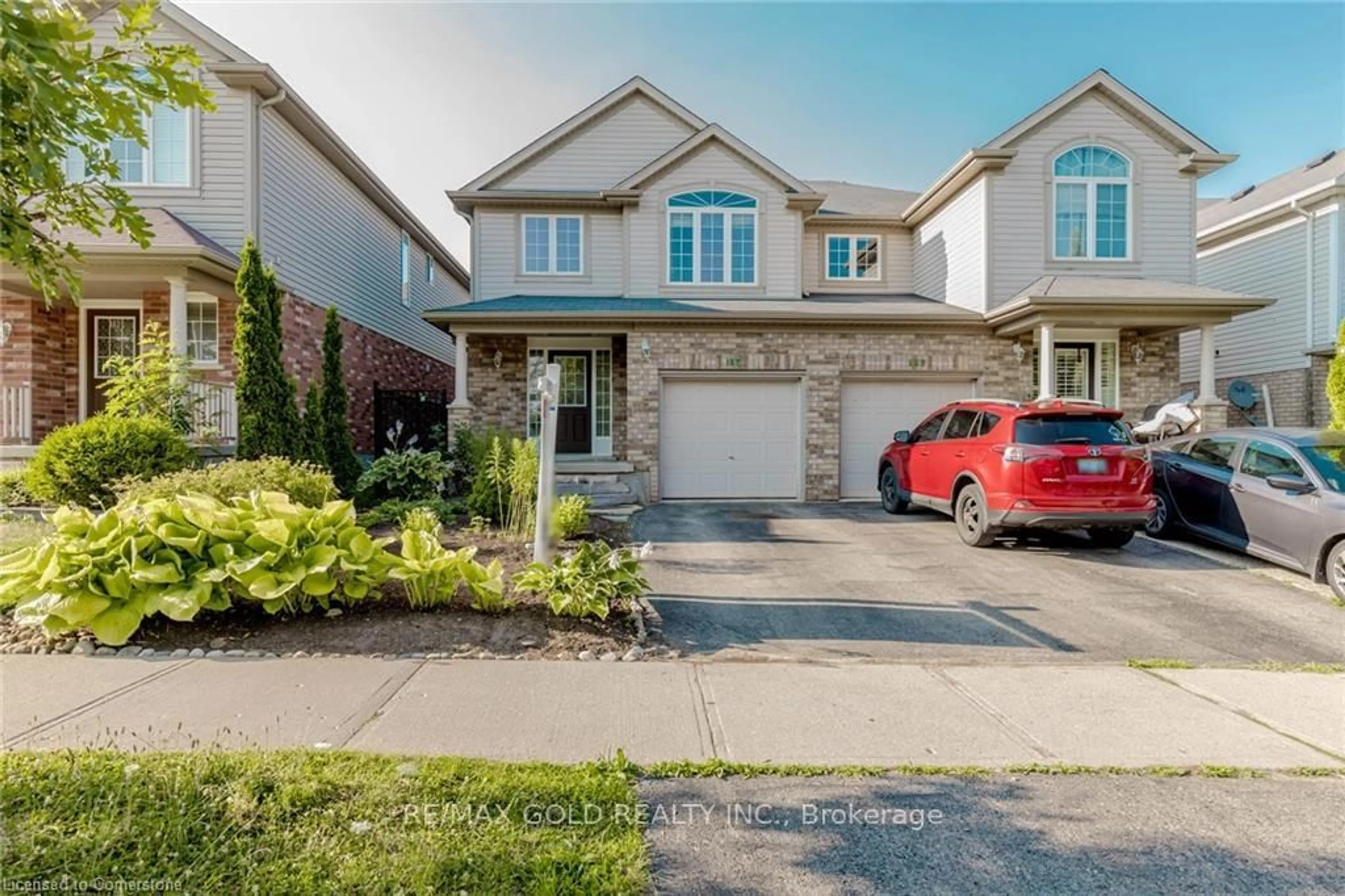 Home with brick exterior material, street for 167 Sims Estate Dr, Kitchener Ontario N2A 0A6