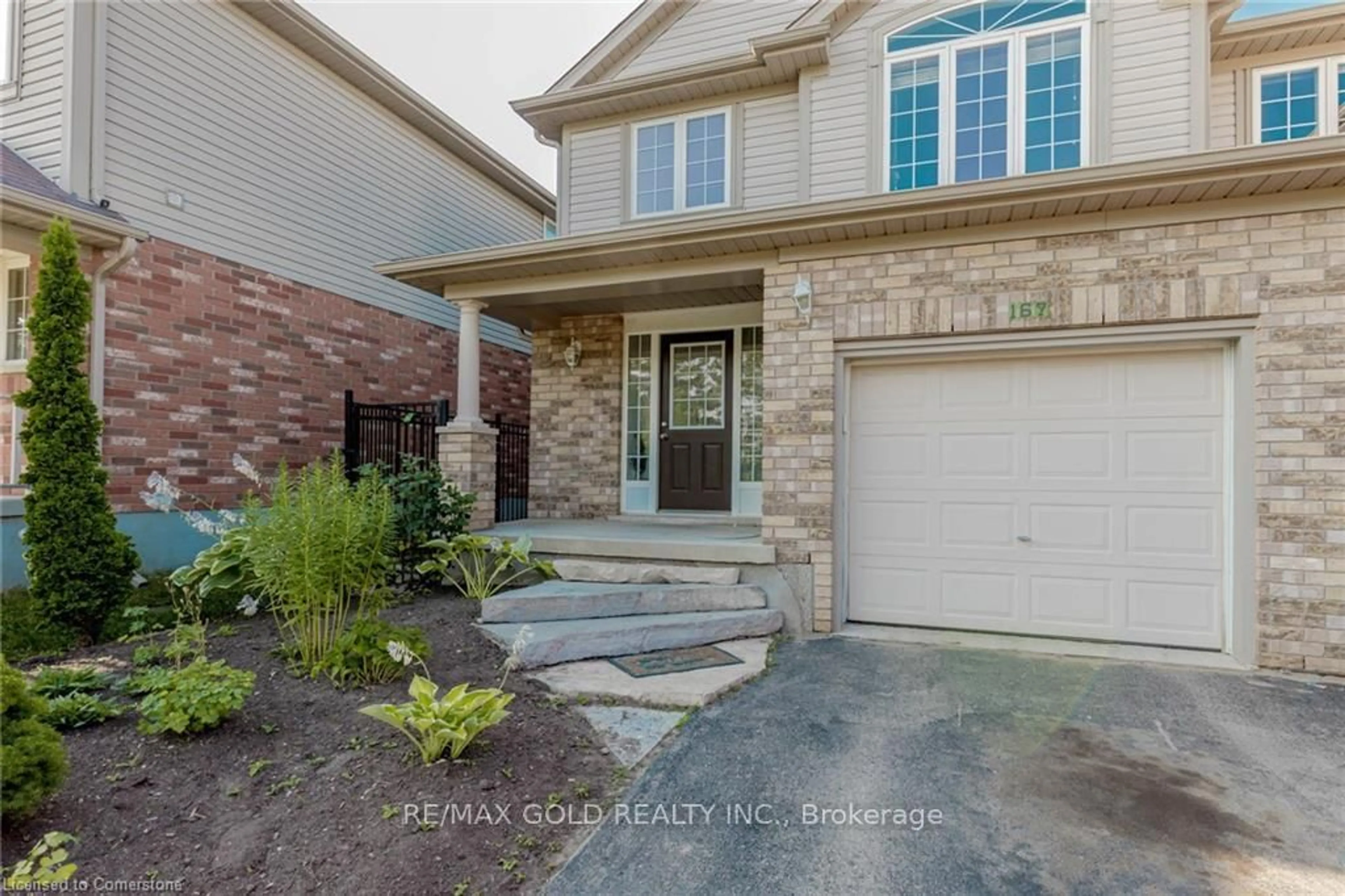 Home with brick exterior material, street for 167 Sims Estate Dr, Kitchener Ontario N2A 0A6
