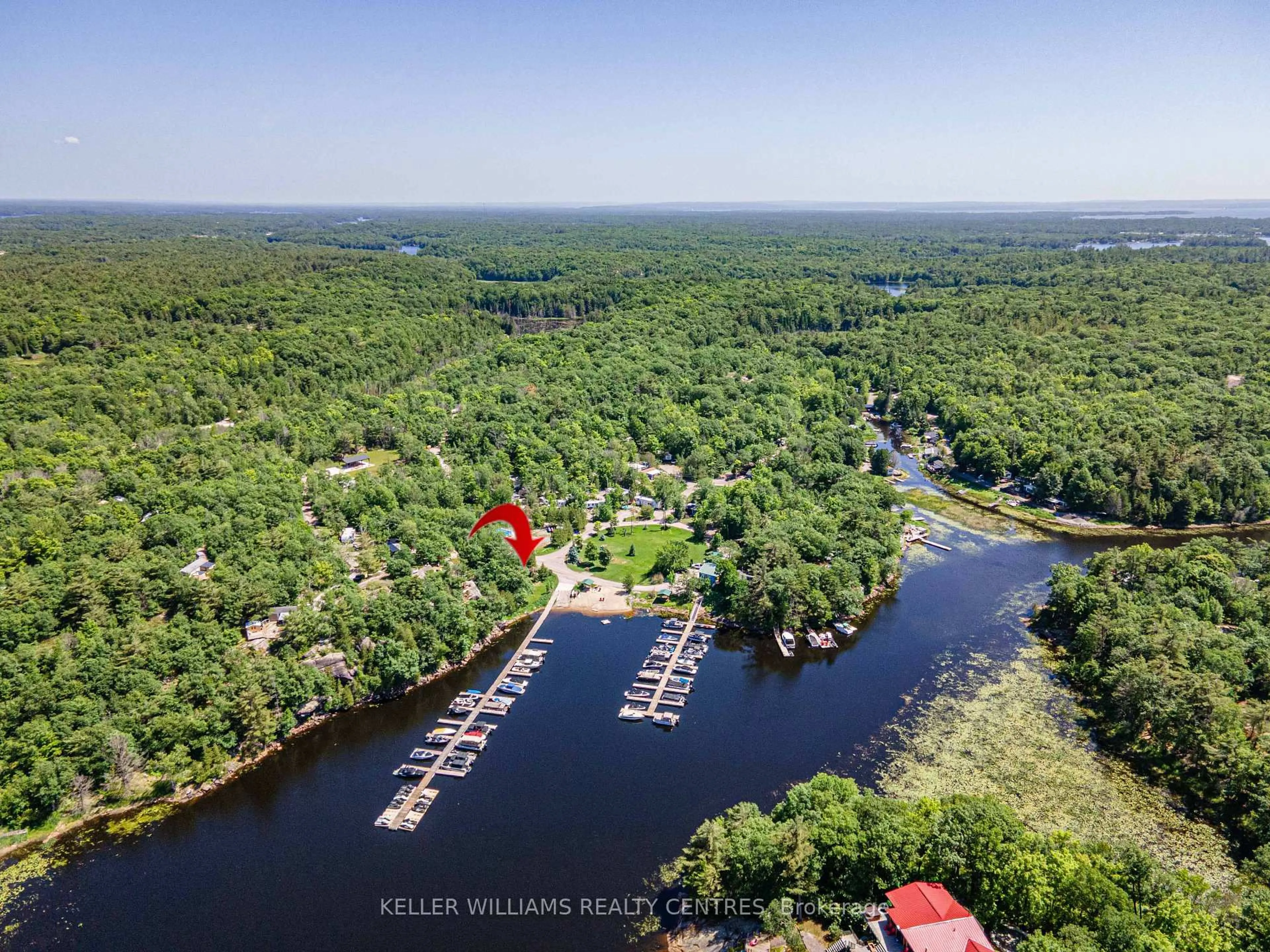 A pic from outside/outdoor area/front of a property/back of a property/a pic from drone, water/lake/river/ocean view for 202 Hidden Glen Rd ##37, Georgian Bay Ontario L0K 1S0