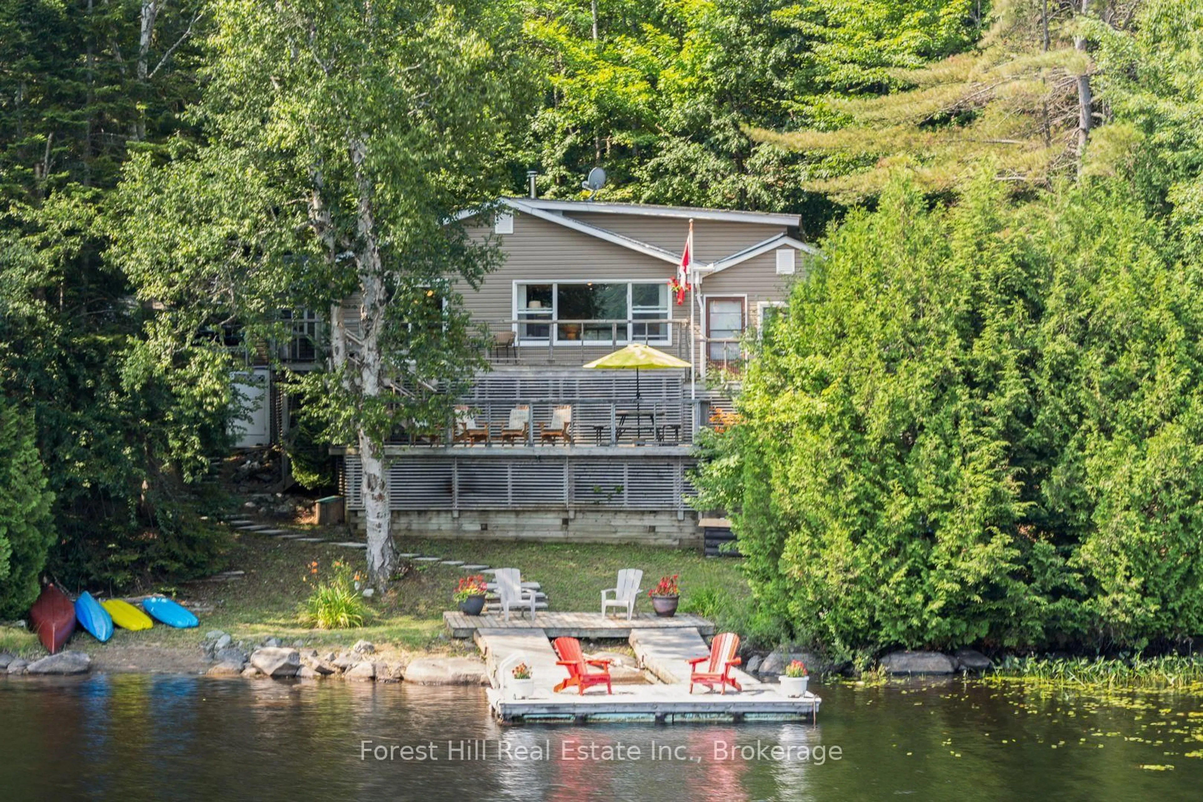 A pic from outside/outdoor area/front of a property/back of a property/a pic from drone, water/lake/river/ocean view for 3477 Livingstone Lake Rd, Algonquin Highlands Ontario P0A 1E0